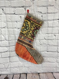 Calza di Natale vintage fatta a mano con tappeto turco
