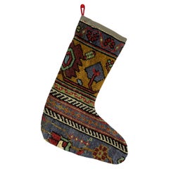Calza di Natale vintage fatta a mano con tappeto turco