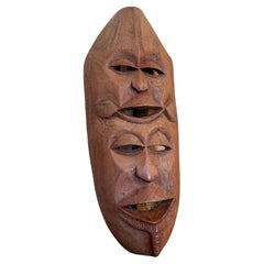 Máscara decorativa abstracta vintage hecha a mano de madera de doble cara