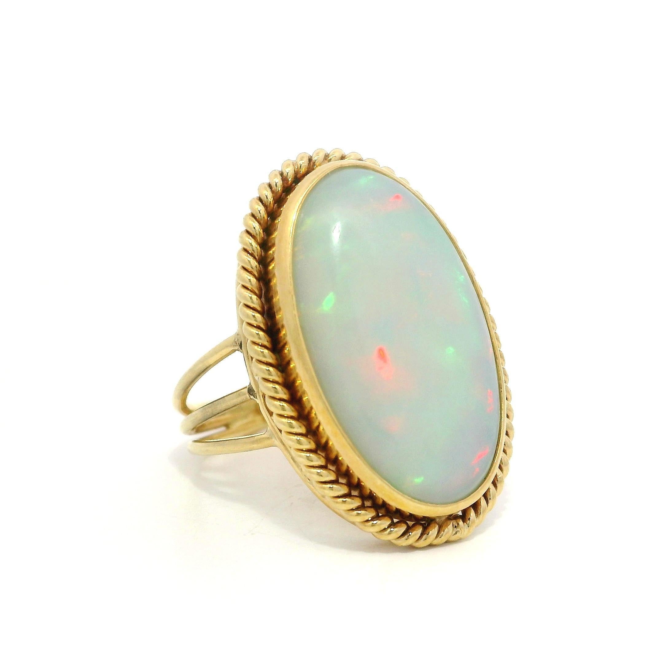 Vintage Handmade Yellow Gold Large White Opal Twisted Wire Bezel Set Ring In Excellent Condition For Sale In Montclair, NJ