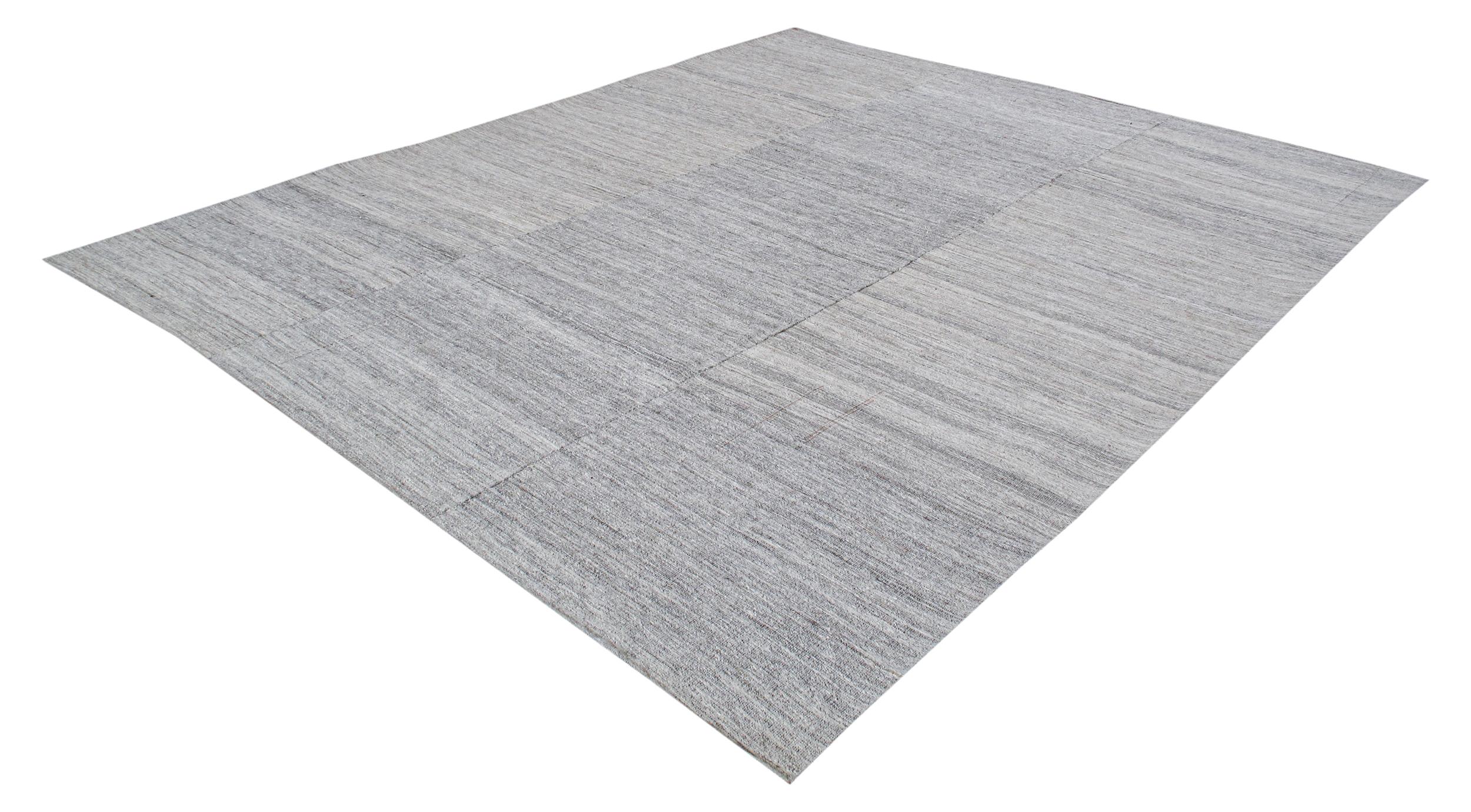 Vintage Handwoven Minimalist Kilim – Natural Gray  One of a Kind

Discover the timeless beauty of this one-of-a-kind vintage kilim, handwoven approximately 50 years ago with exceptional craftsmanship. Featuring a minimalist design and a rare natural