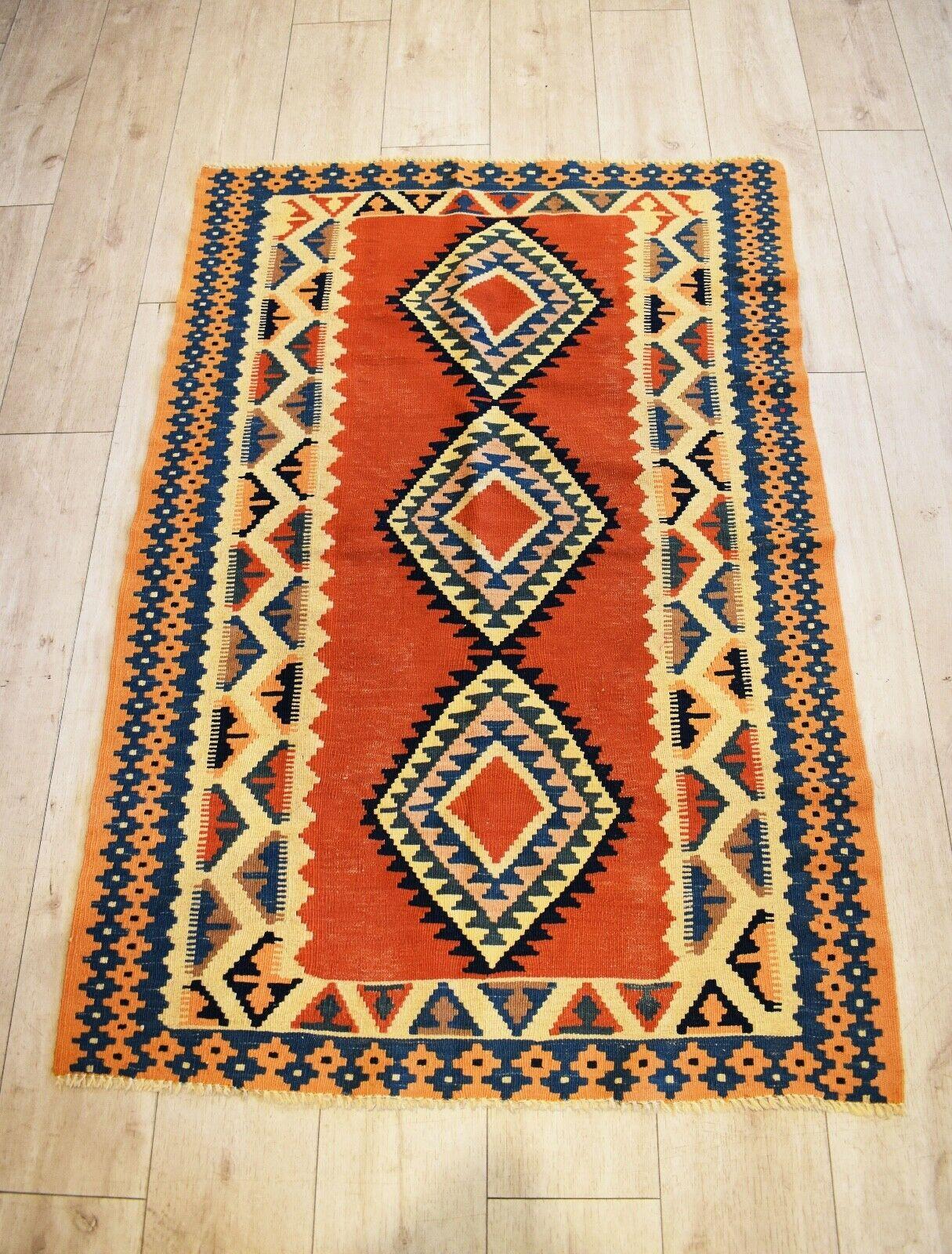 Very rare and unusual beautiful handwoven vintage Kilim runner
with patterns in shades of natural dyed orange, blues, black, and yellow colours
Handwoven with natural dyes.
Has a lovely aged patina & nice quality.