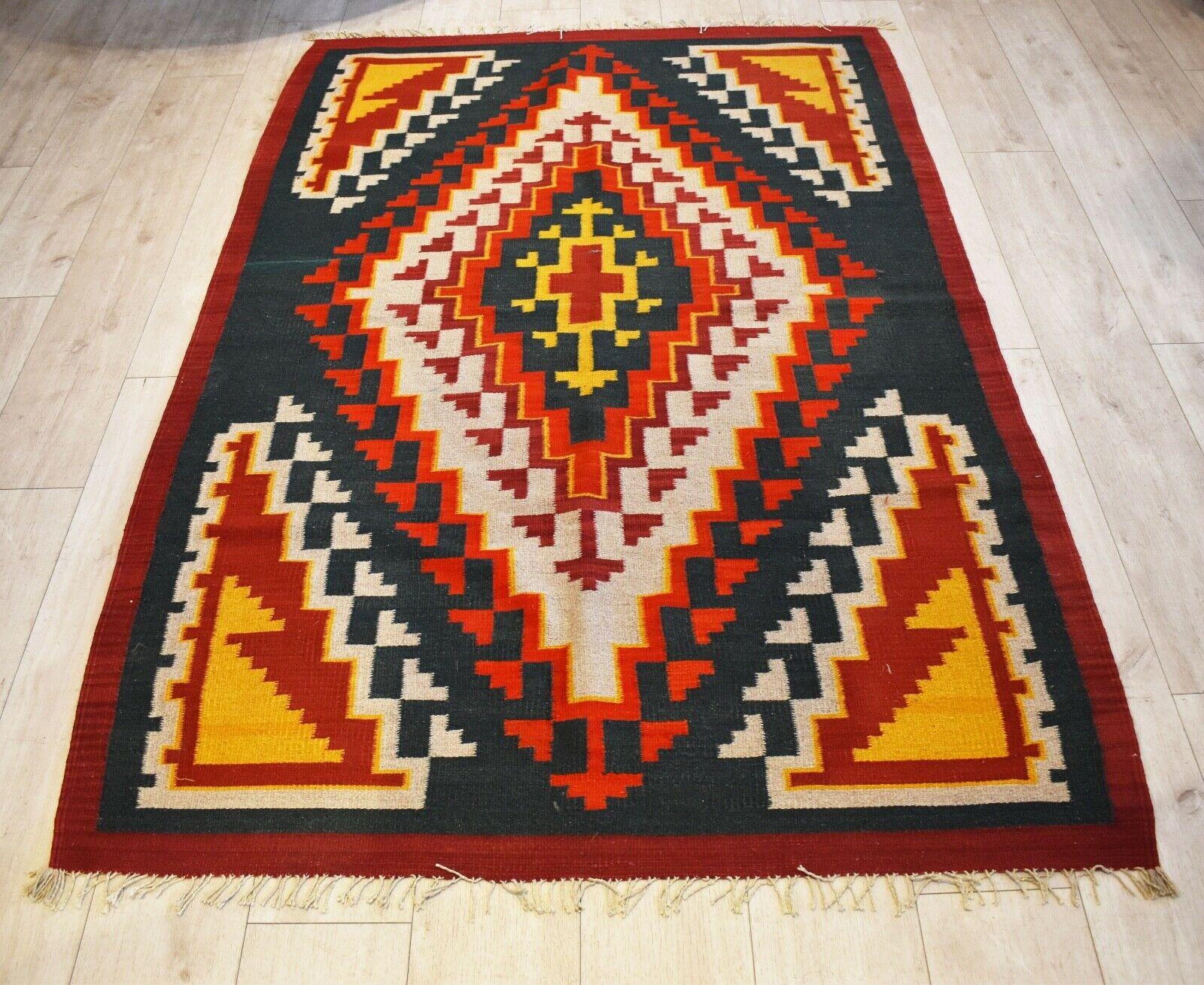 Very rare and unusual beautiful handwoven vintage Kilim runner
with patterns in shades of natural dyed red, orange, charcoal black, and yellow colors
Handwoven with natural dyes.
Has a lovely aged patina & nice quality.