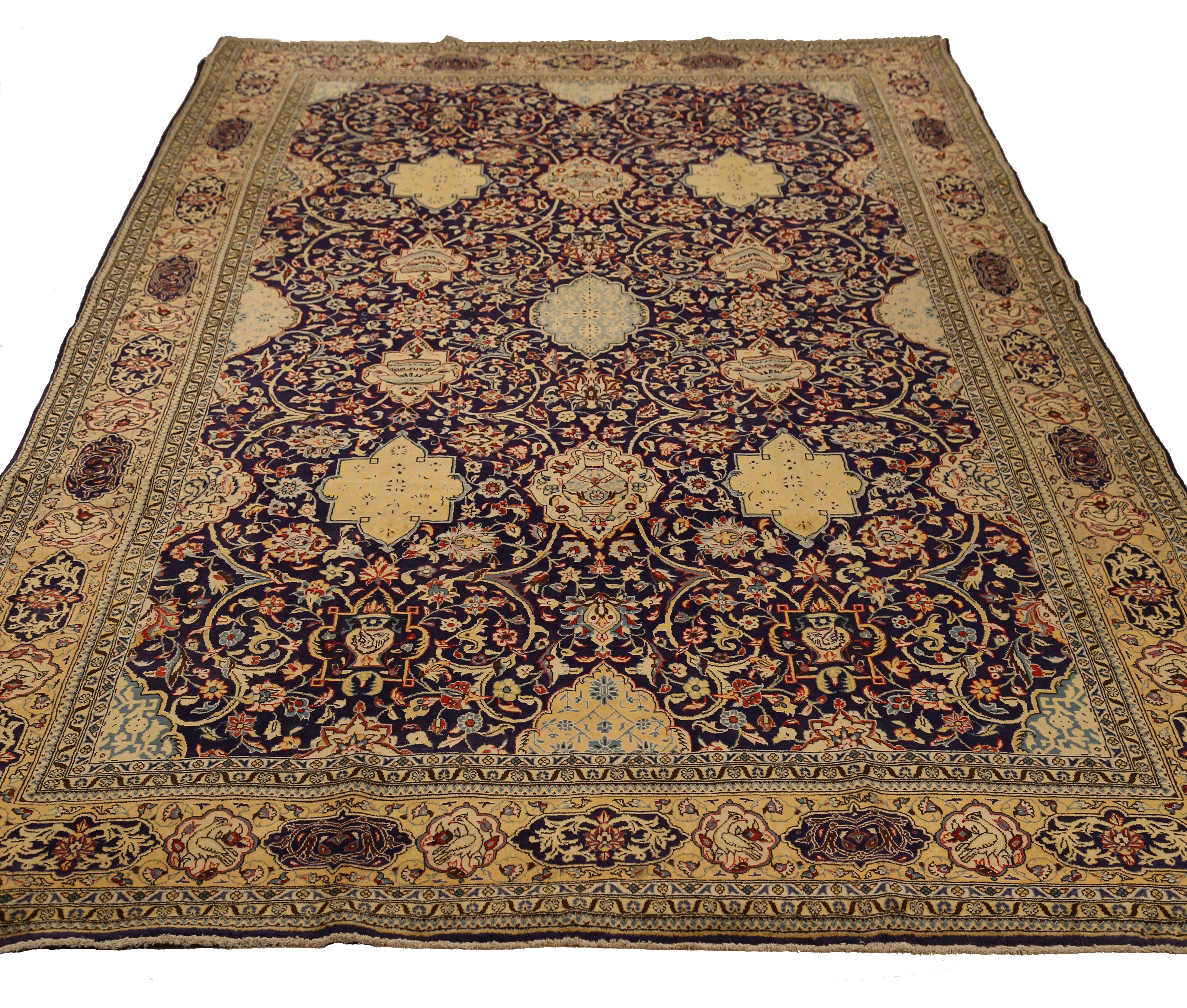 Hand-woven Persian rug made from fine wool and all-natural vegetable dyes. It's a magnificent piece featuring an intricate mix of floral and botanical patterns that made Qom design one of the most sought-after area rugs made in ancient Iran. The