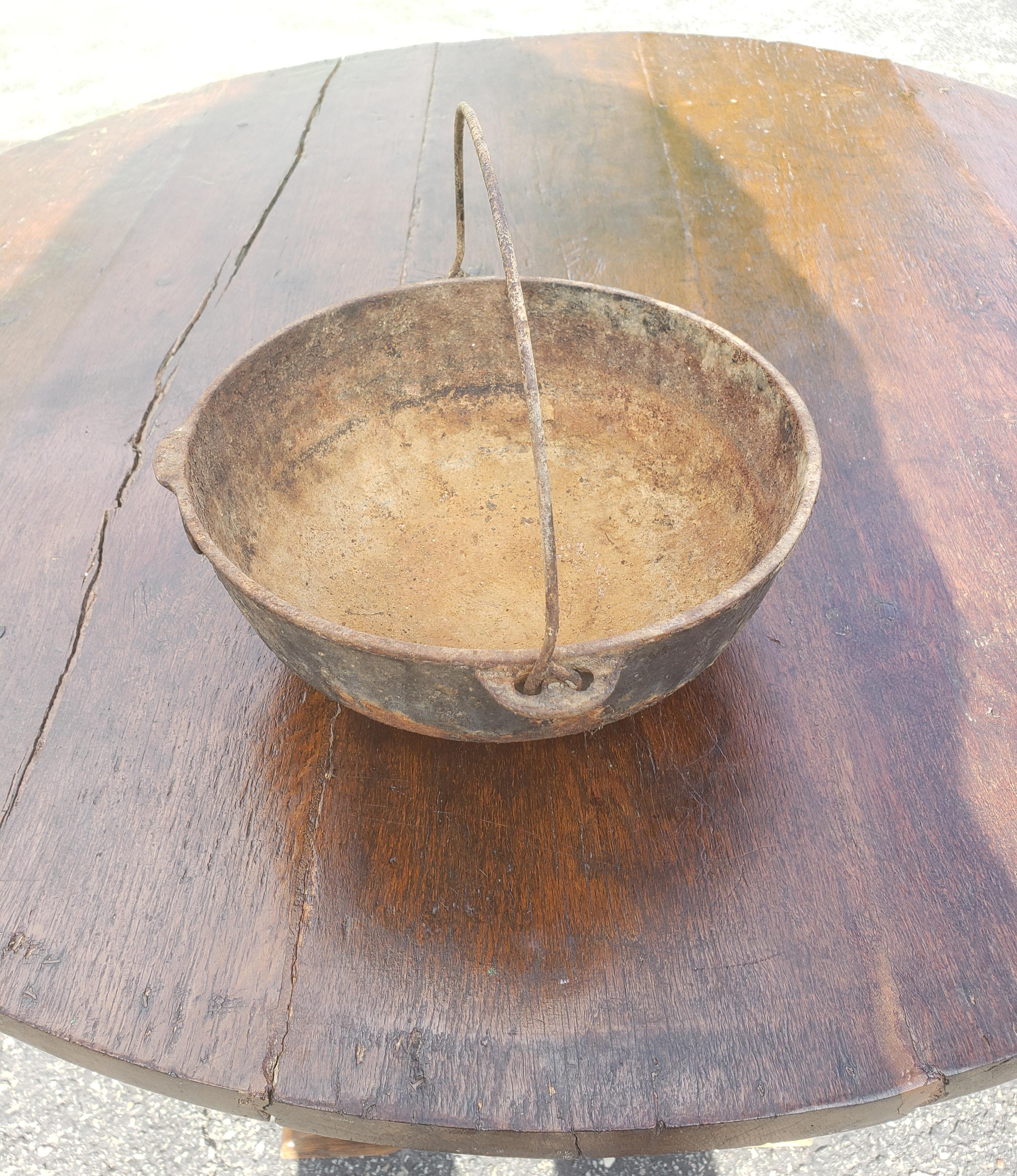 20th Century Vintage Hanging Kettles with Wonderful Rustic Patina circa 1900s, a Pair For Sale