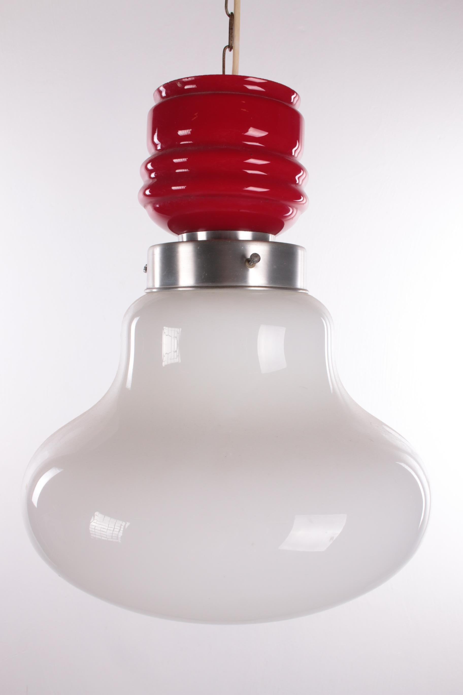This is a particularly beautiful hanging lamp with red and white glass. 

The fun shape is somewhat reminiscent of a mushroom and the red detail makes this lamp a striking eye-catcher.

This lamp will fit beautifully with your