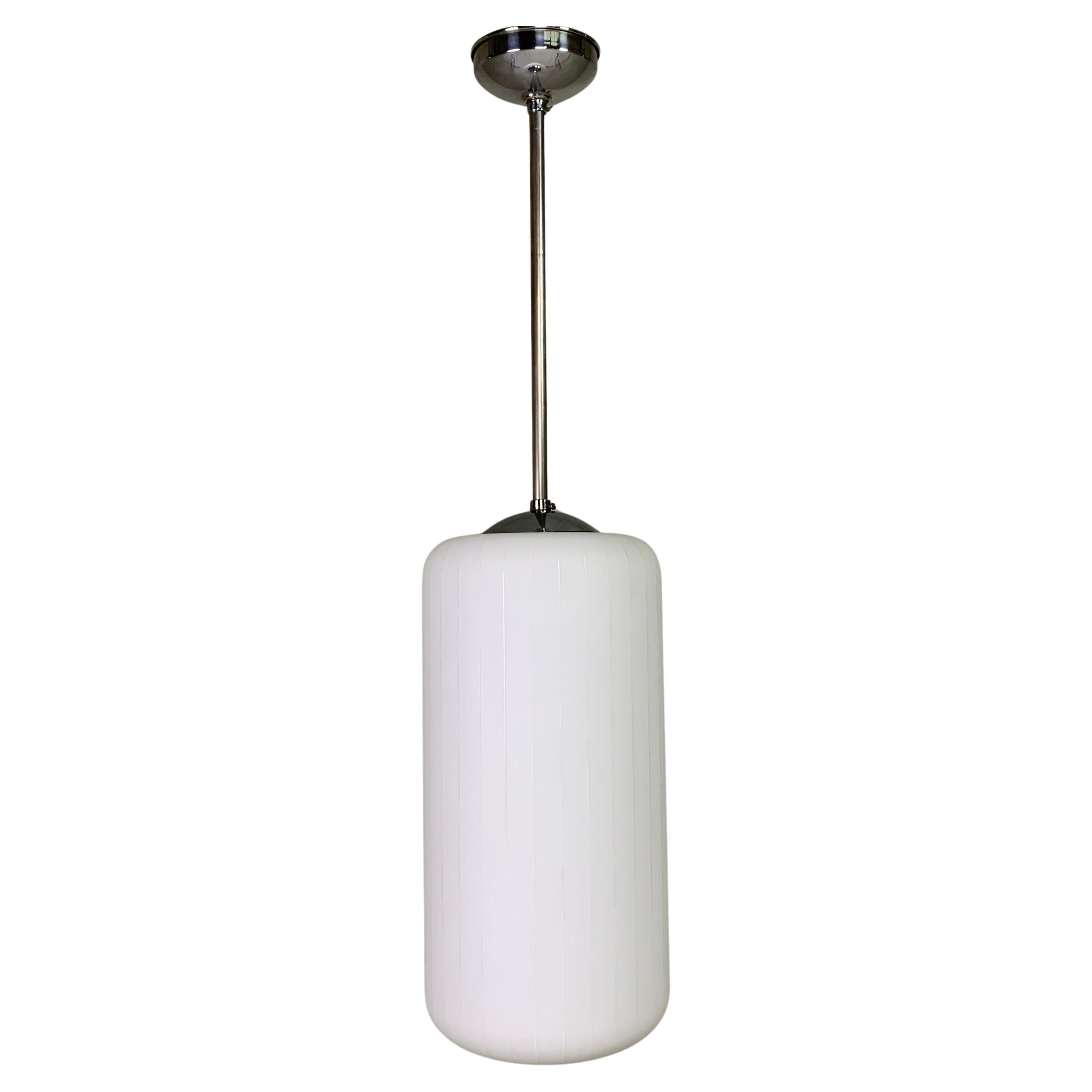 Vintage hanging lamp with cylindrical white glass shade, 1950s For Sale