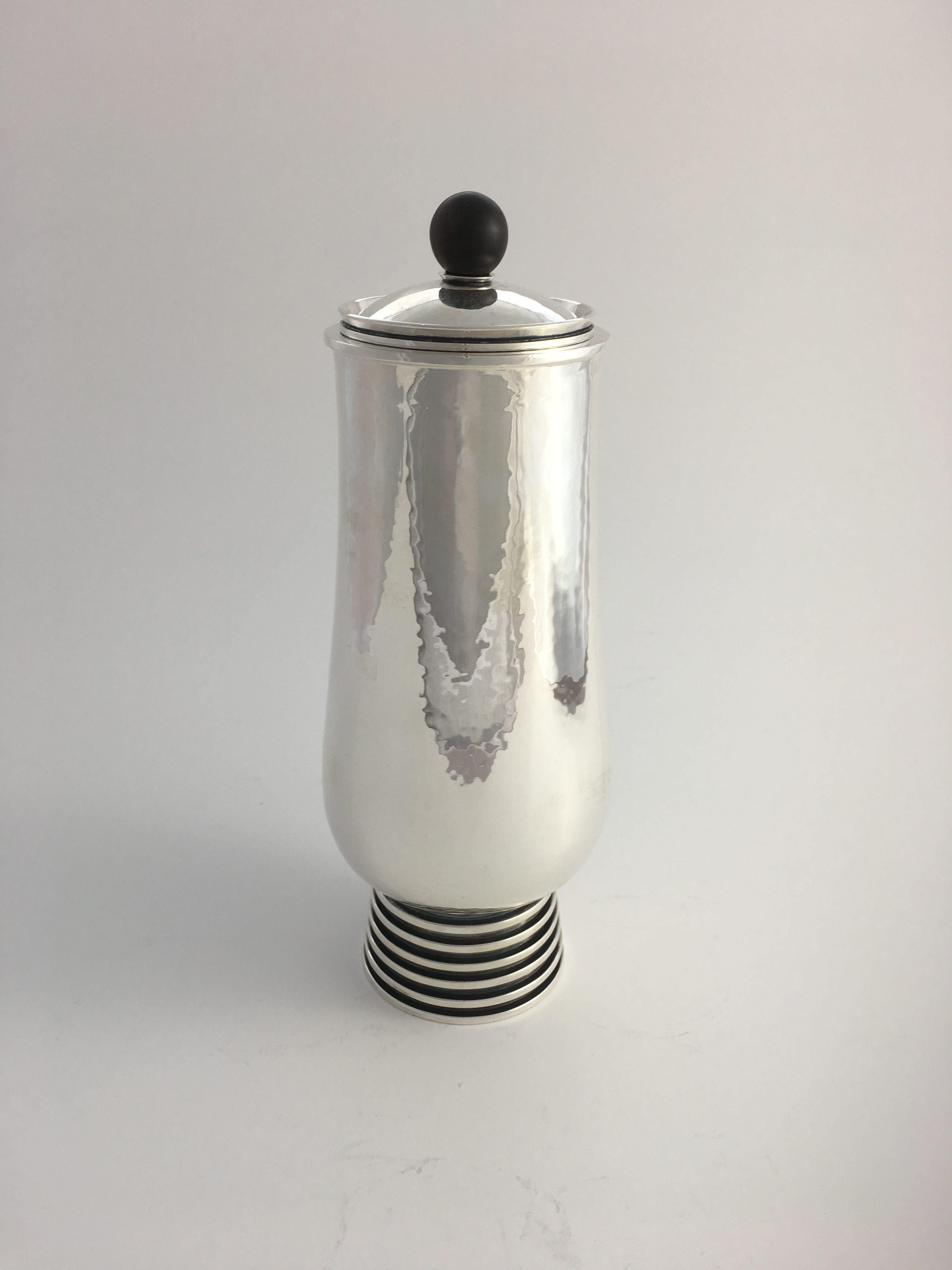 Vintage sterling silver Hans Hansen Art Deco lidded cannister with ebony finial, design #200 from 1934 by Karl Gustav Hansen.
Measures 9 1/4? in height (23.5cm). Gross weight 18.5oz (525g).
Vintage Hans Hansen hallmark and date stamp for