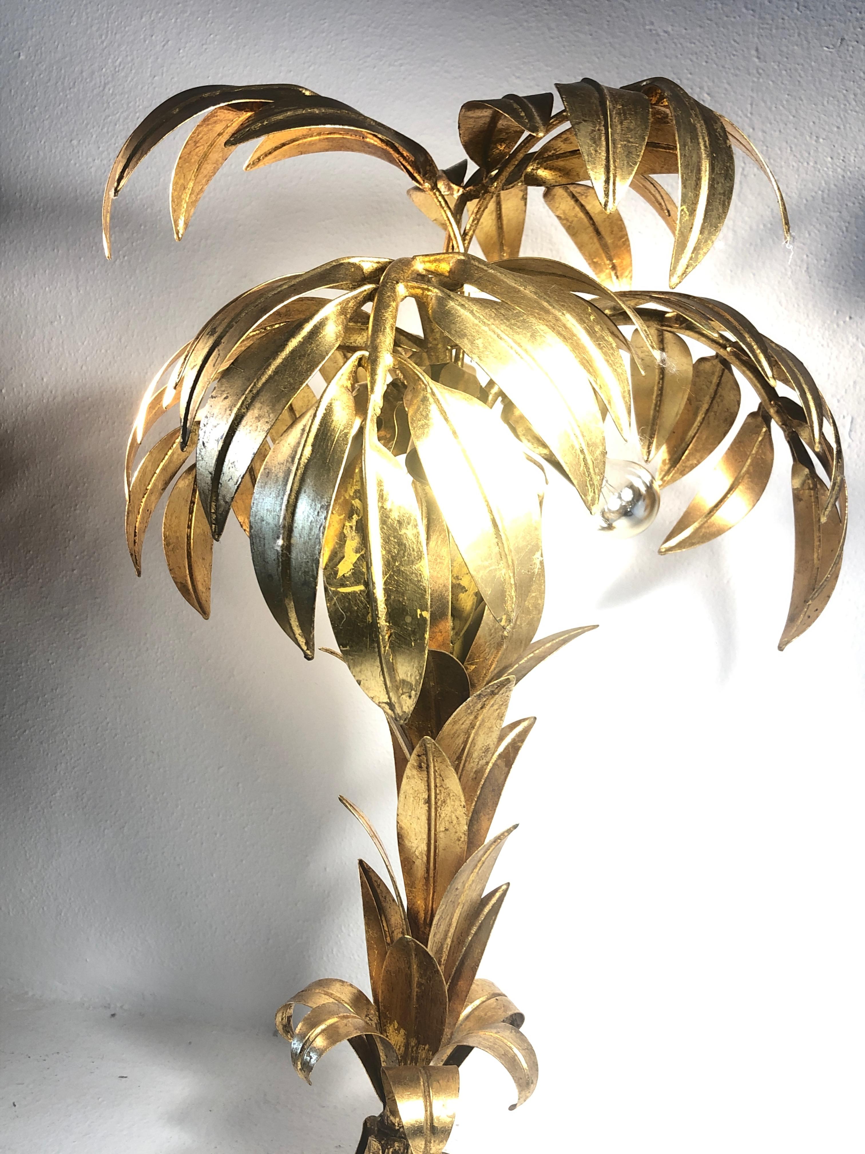 Rare Hans Kögl gilt palm tree table lamp, 1970s

This piece is in near excellent condition with no structural damage, please study the pictures.

An amazing and seldom piece.
        