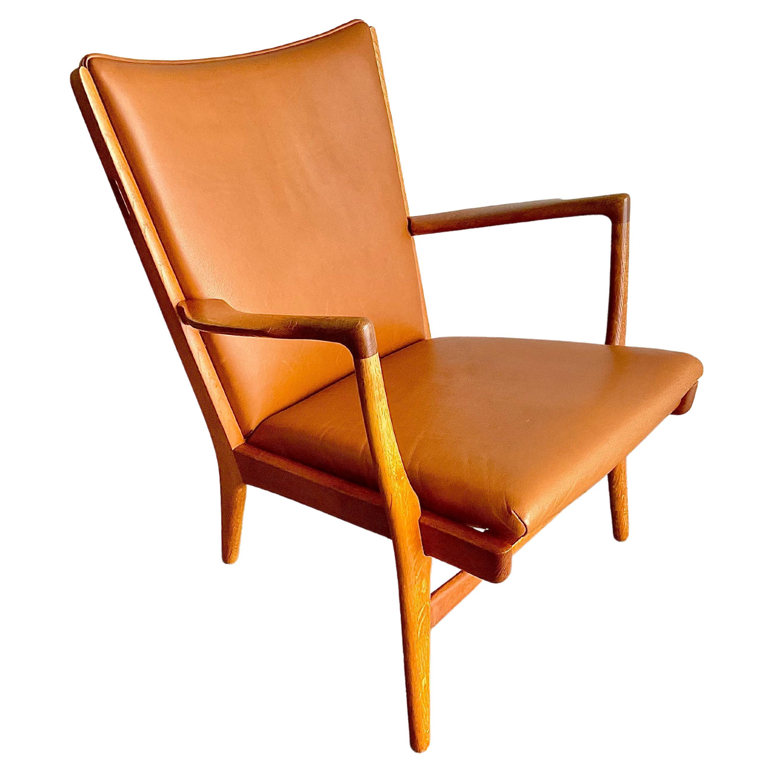 Vintage Hans Wegner AP-16 Lounge Chair in Oak & Cognac Leather, 1951 For Sale