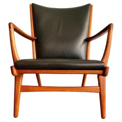 Fauteuil de salon vintage AP-16 en teck et cuir noir de Hans Wegner, 1951