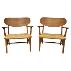 Sedie da salotto vintage Hans Wegner CH22 Carl Hansen & Son Oak Easy Chairs MCM, una coppia