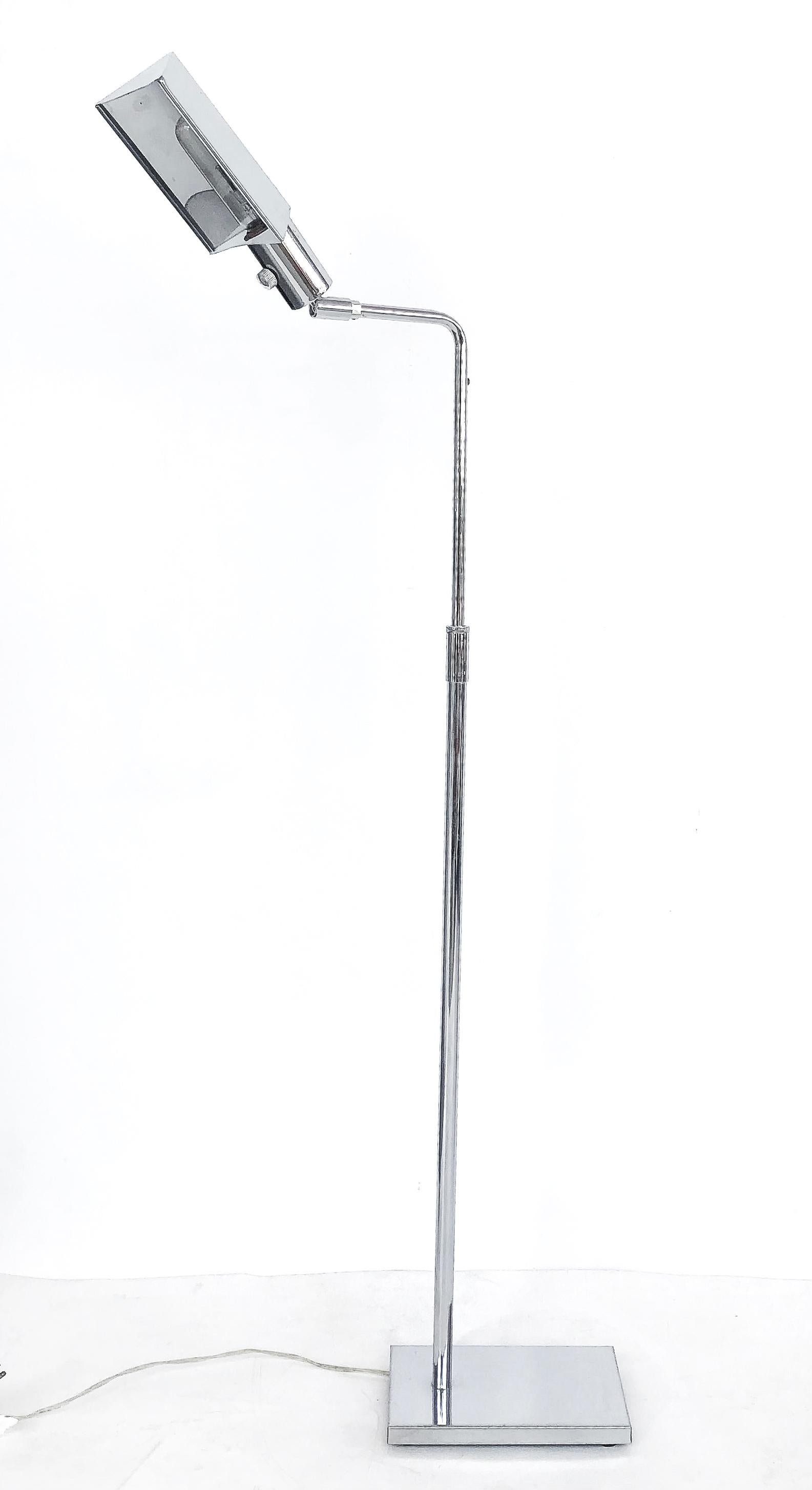 Vintage Hansen NY chrome adjustable floor lamp

Offered for sale is a vintage Hanson chrome floor lamp with an adjustable head. The lamp is marked behind the head. The base is rectangular and there are some losses to the chrome on the neck of the