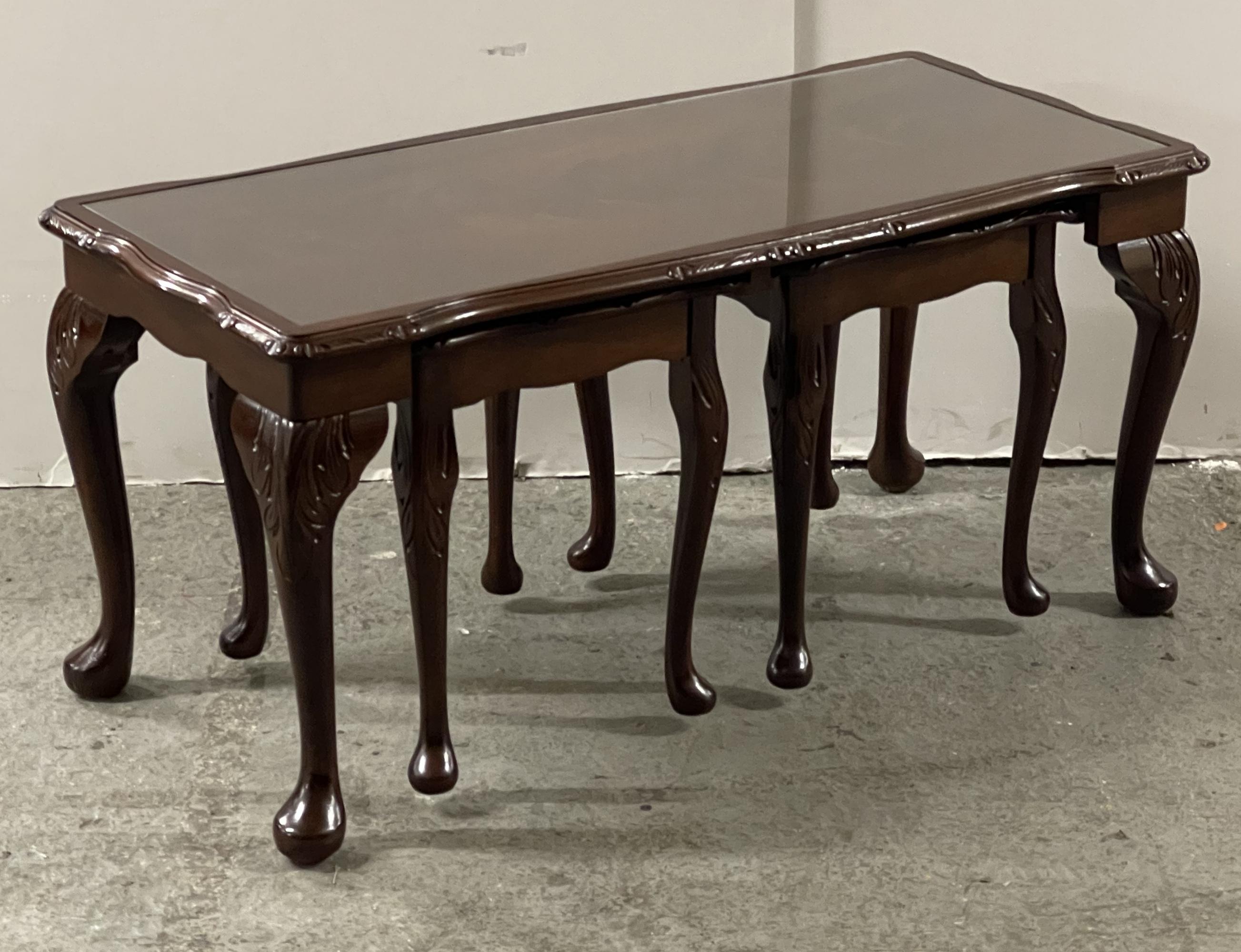 Here we have for sale this lovely vintage mahogany carved detailing coffee, side nest of three tables with glass inset tops.

These tables are in good condition with small signs of wear as you can see from the detailed