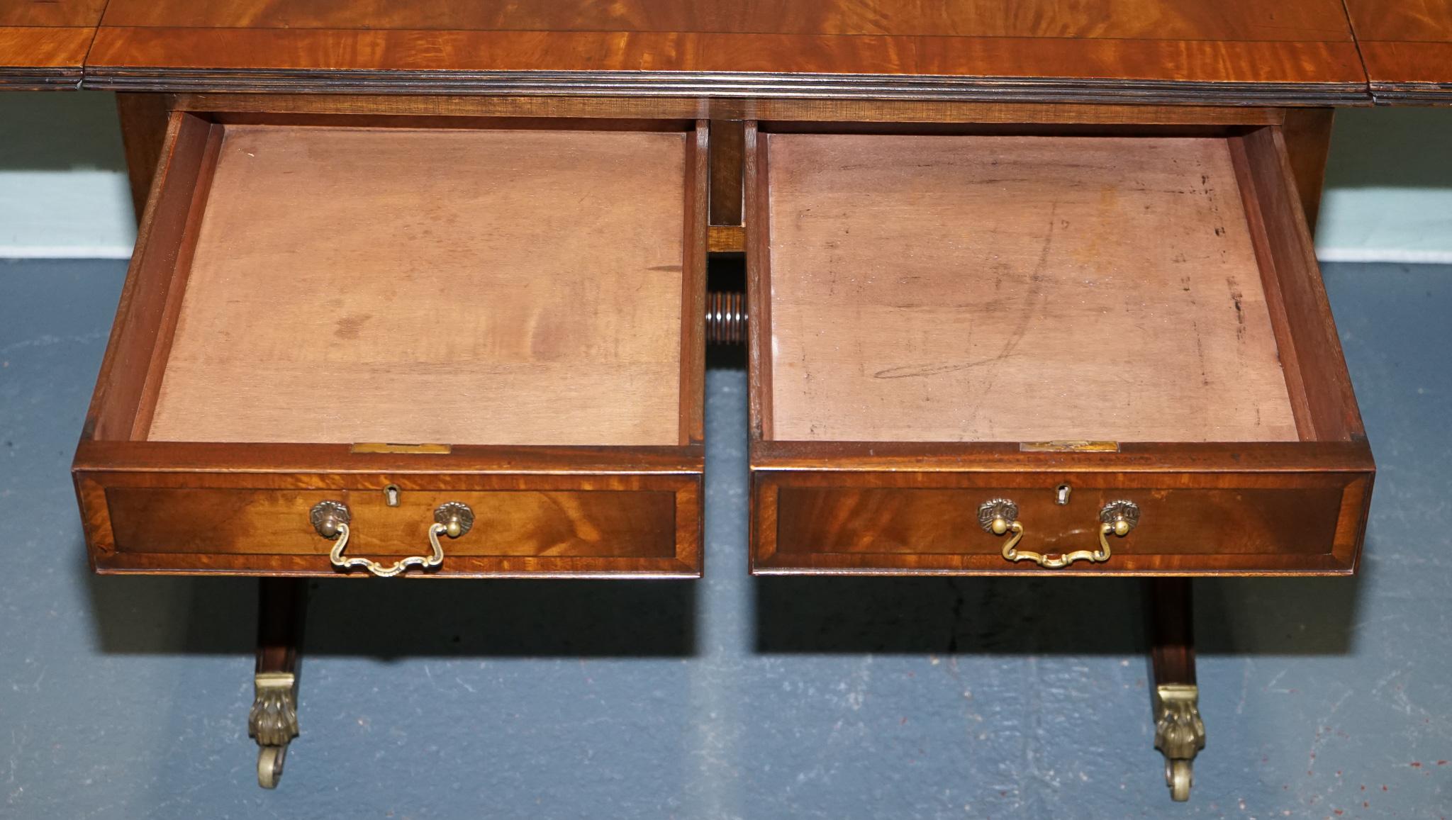 VINTAGE HARDWOOD DROP LEAF SIDE TABLE WiTH SABER LEGS AND BRASS PAW FEET For Sale 3