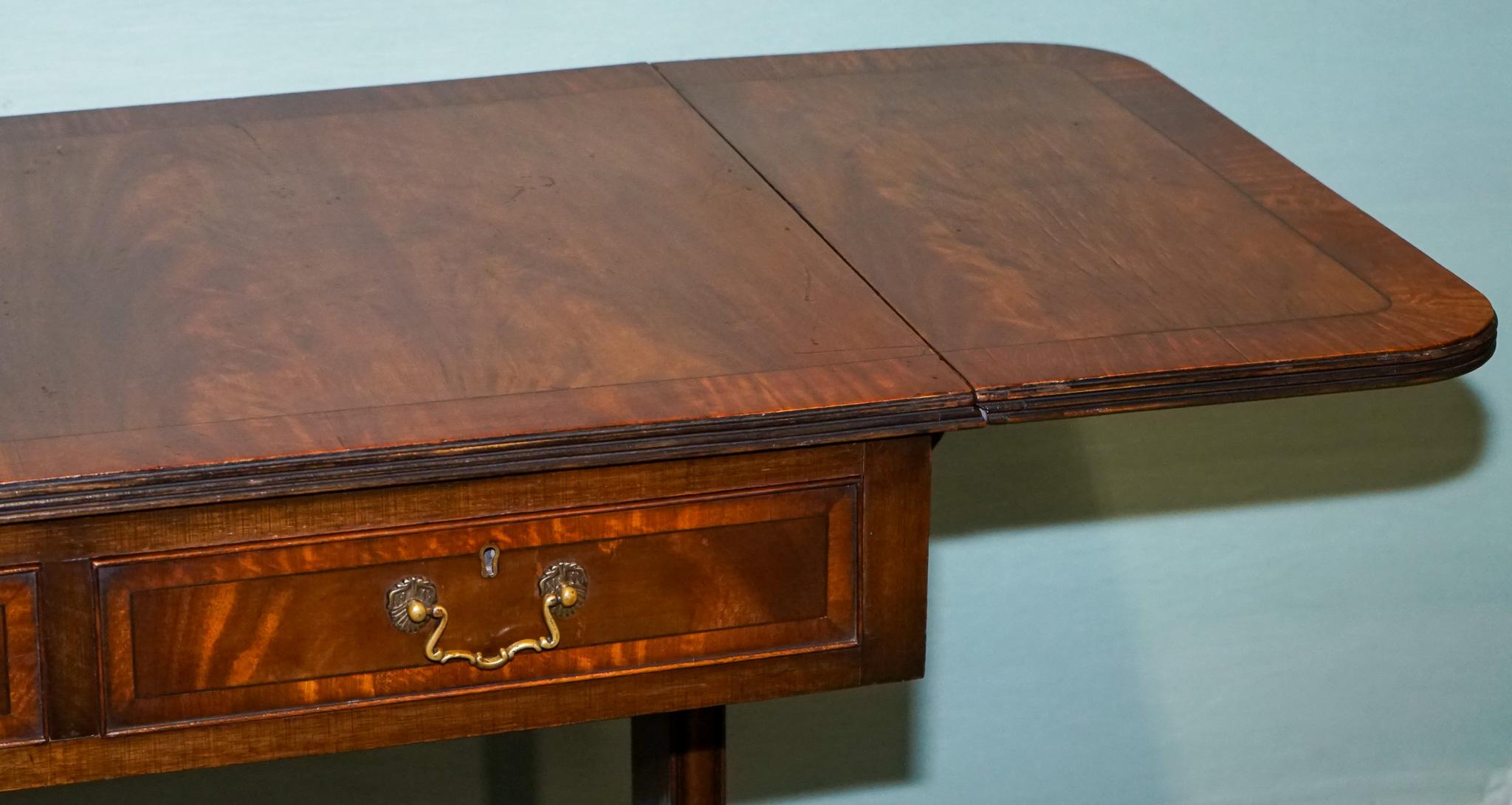 VINTAGE HARDWOOD DROP LEAF SIDE TABLE WiTH SABER LEGS AND BRASS PAW FEET In Good Condition For Sale In Pulborough, GB
