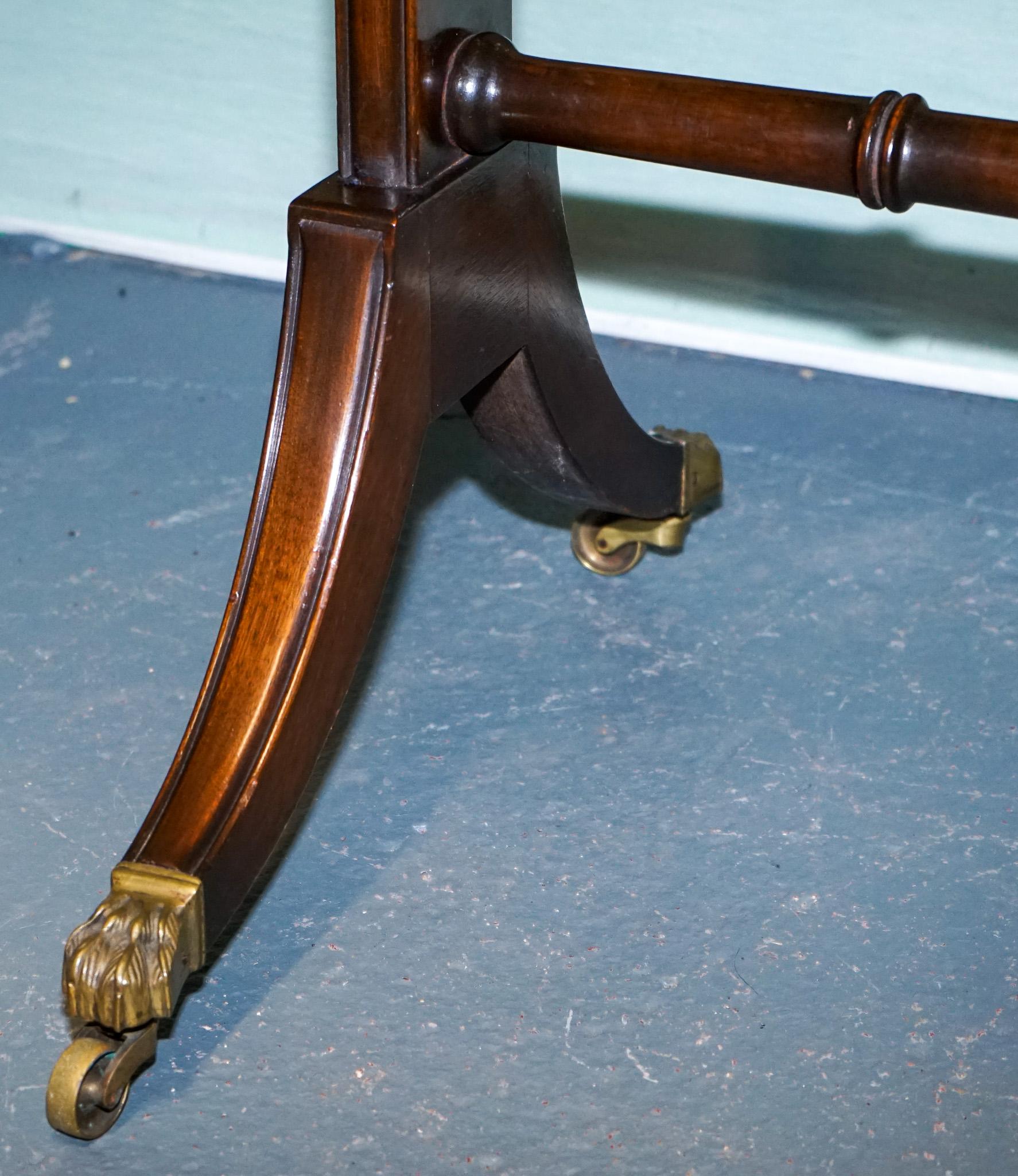 Hardwood VINTAGE HARDWOOD DROP LEAF SIDE TABLE WiTH SABER LEGS AND BRASS PAW FEET For Sale