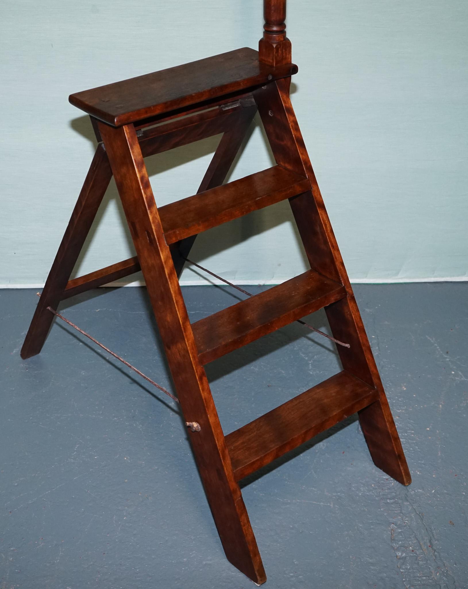 
Antiques of London



A superbly crafted folding mahogany library step ladder, featuring a warm, rich patina and traditional joinery, finished with a striking turned finial pole handle. Designed in the manner of a 19th-century English gentleman's