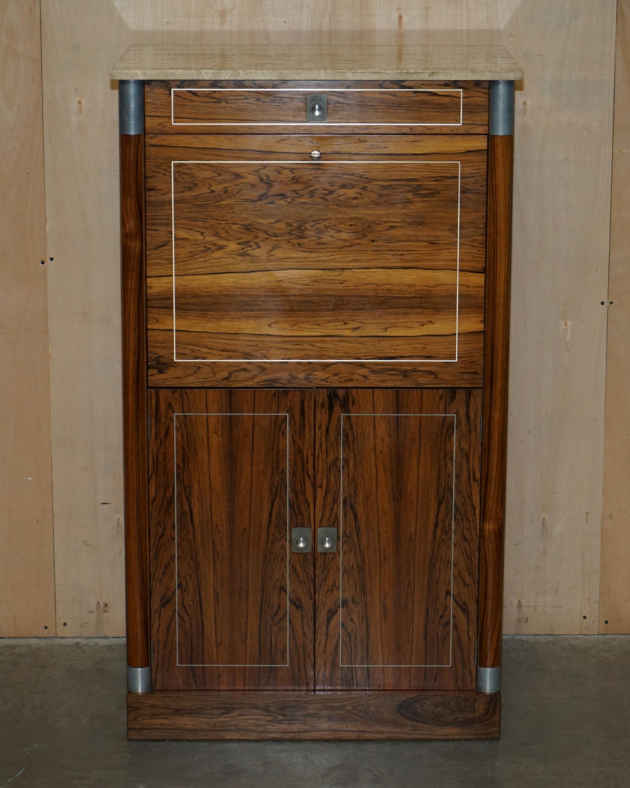 We are delighted to offer for sale this exquisite, tall, Rosewood with marble top and chrome fittings free standing Secratire desk 

A truly stunning desk, its very large and yet doesn't take up much floor space as it is large going up, you can
