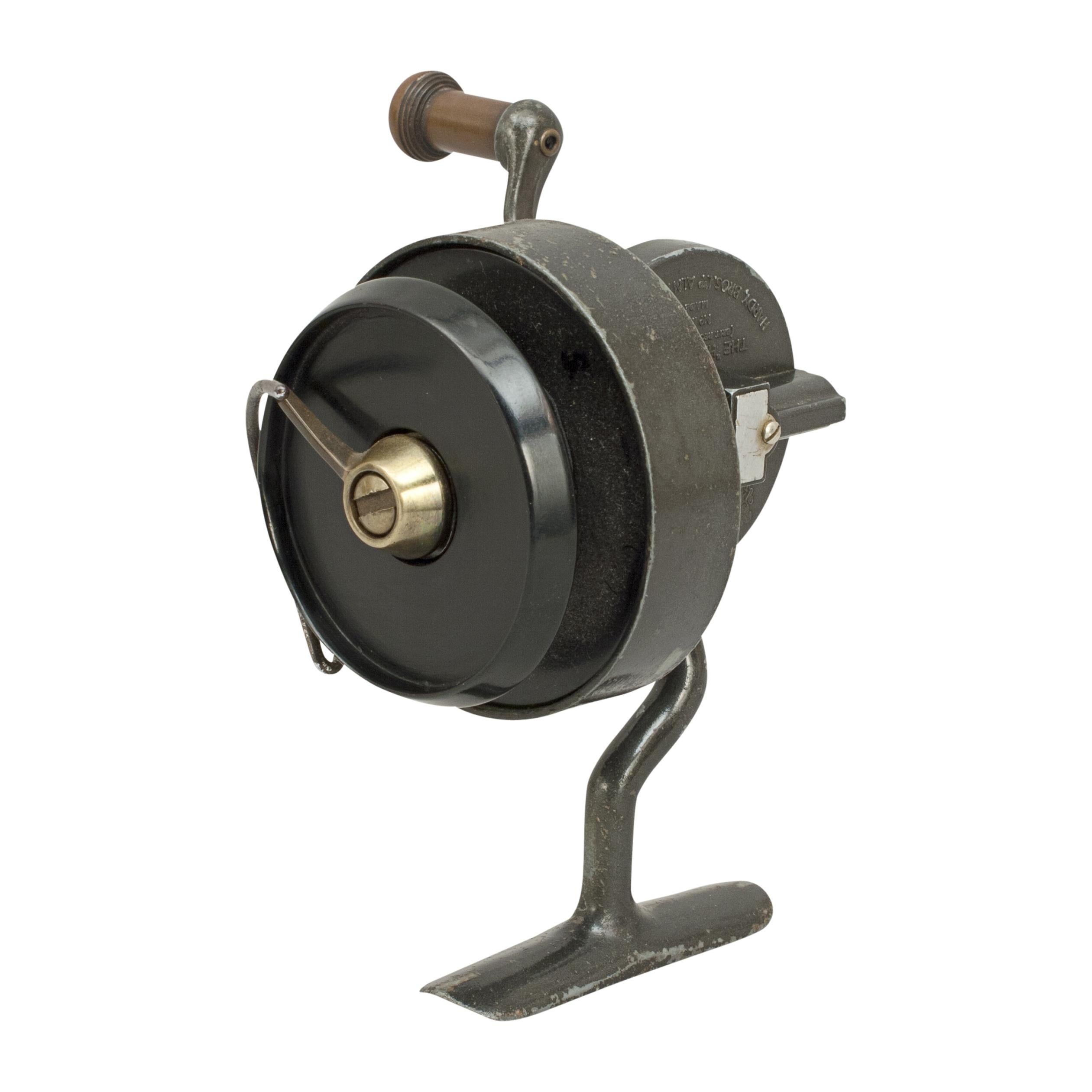 Hardy Hardex fishing reel.
A great fixed spool fishing reel by Hardy of Alnwick, England. The reel is is very good condition with half bale arm, a bakelite spool and brass drag. The side plate has the coat of arms of King George V with the Prince