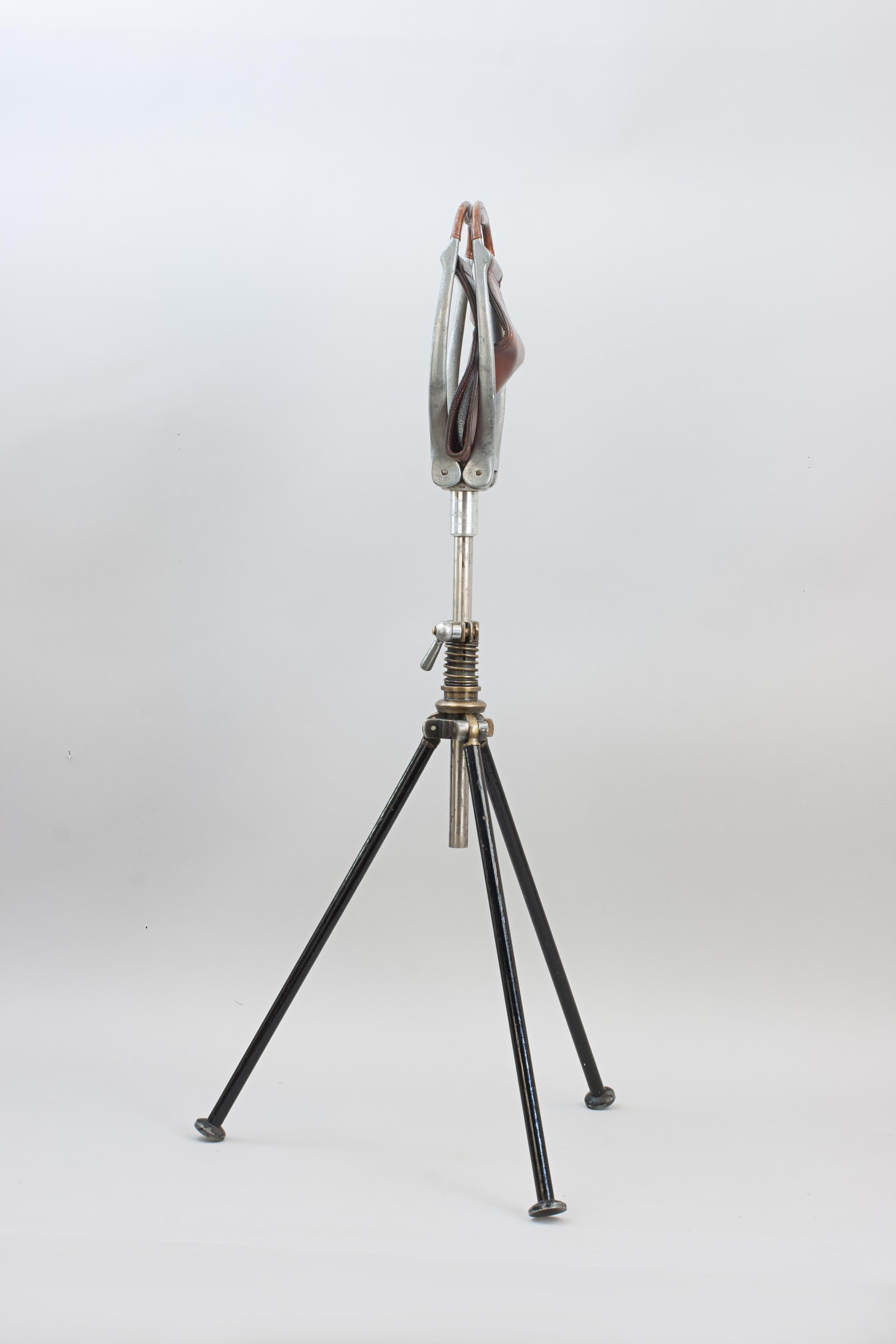 Antique Hardy Fishing, Shooting Stick, Seat.
A rare Hardy's tripod sportsman's walking stick seat in great original condition. The seat is fixed to a single telescopic column and has three steel legs with foot discs. The telescopic leather hammock