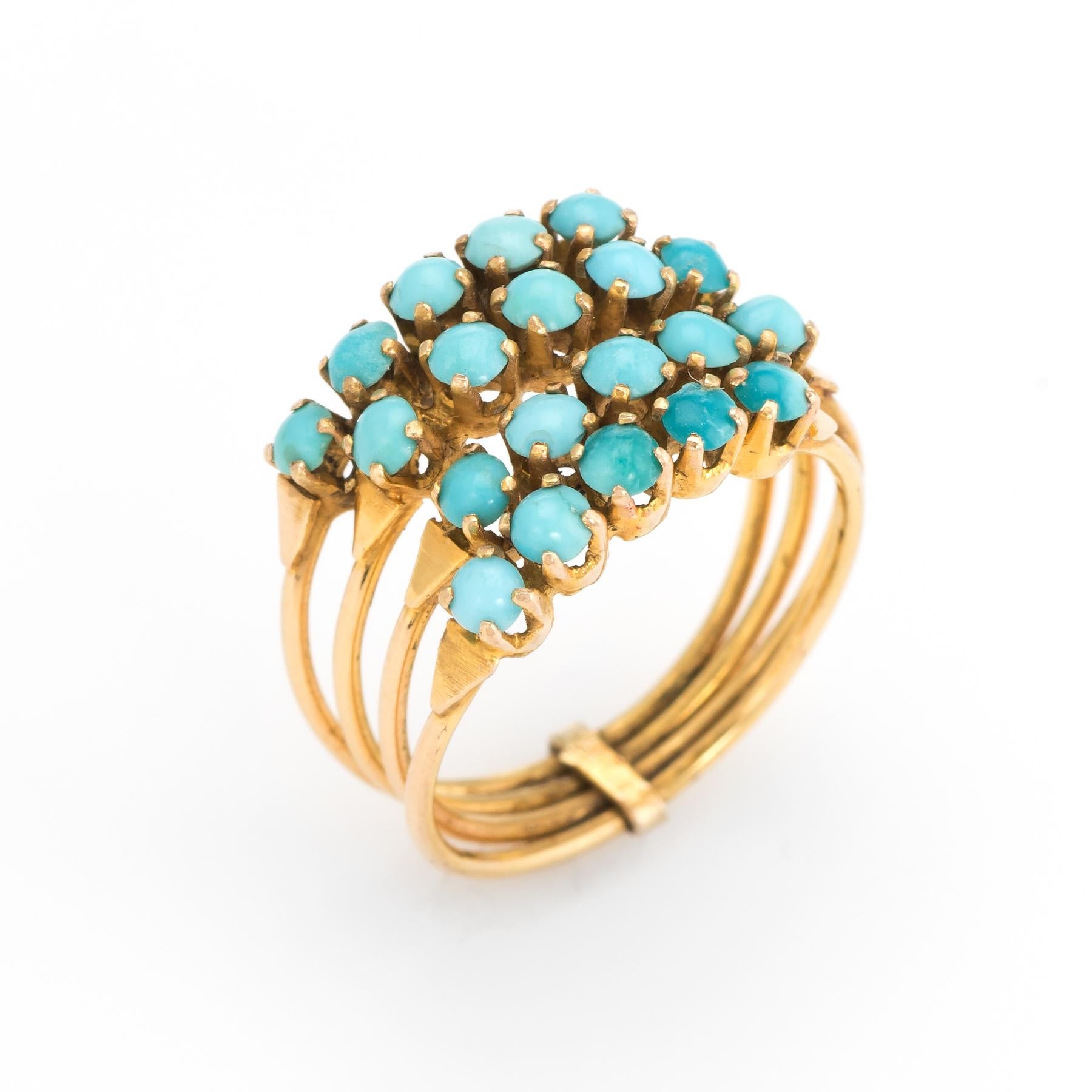 Fun vintage Harem ring (circa 1950s to 1960s), crafted in 18 karat yellow gold. 

Turquoise cabochons each measure 2.5mm and are set into the 4 bands. The turquoise does vary in color (see photos) along with a few small chips to the stones (visible