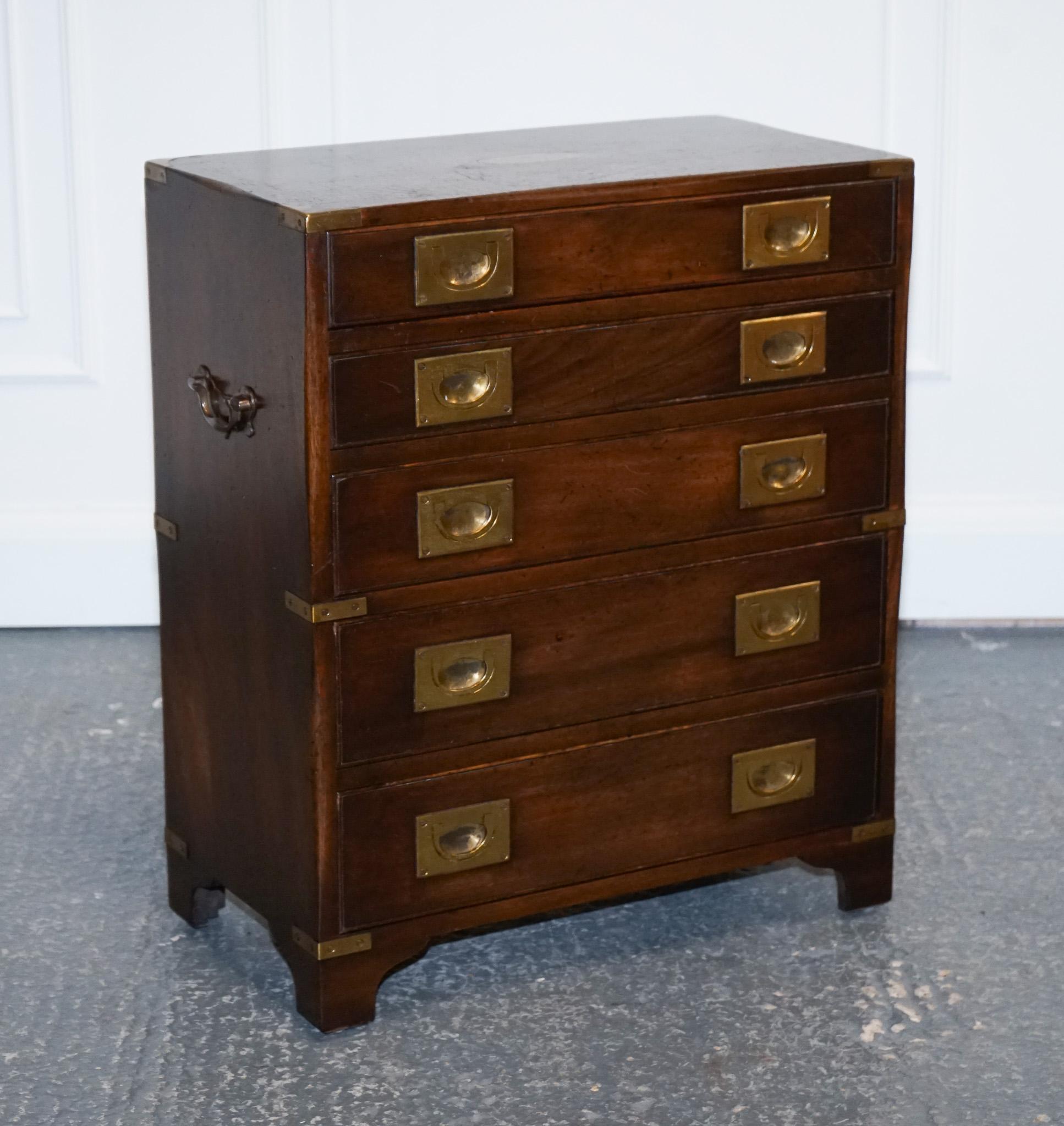 We are delighted to offer for sale this Beautiful Vintage Kennedy for Harrods Campaign.

This vintage Harrods Kennedy military campaign chest of drawers is a stunning piece of furniture that exudes timeless elegance. It features five graduated