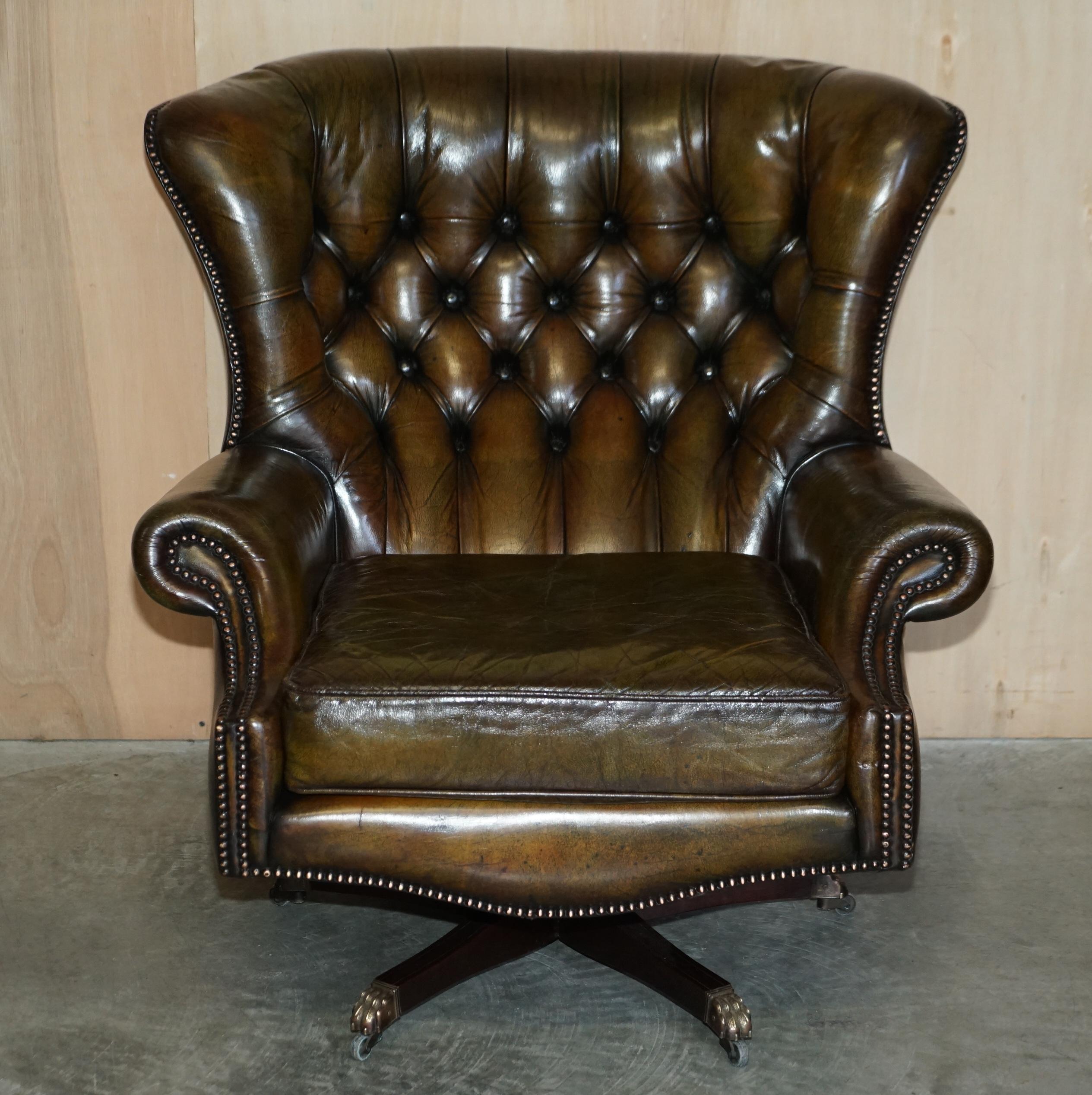We are delighted to offer for sale this stunning original vintage Mid Century Modern Harrods London retailed hand dyed brown leather restored swivel armchair.

A super comfortable and stylish swivel armchair, this was made by Pegasus and retailed