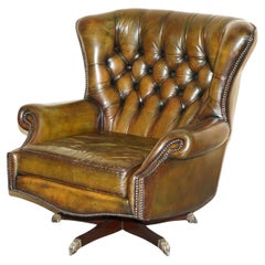 Vintage Harrods London circa 1970's Petrol Brown Leather Swivel Lounge Armchair