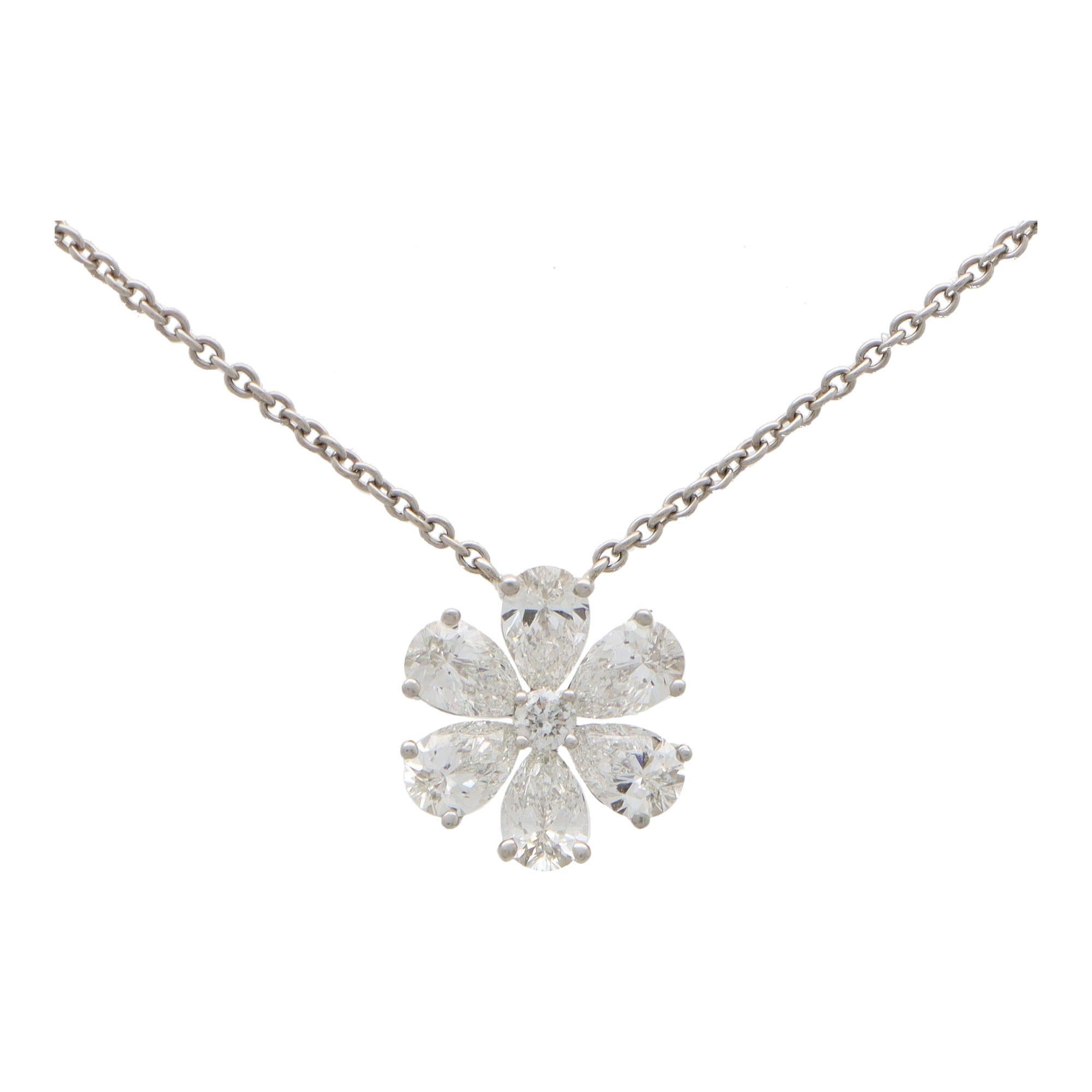 A vintage Harry Winston ‘Forget Me Not’ diamond flower pendant necklace set in platinum. 

From a current Harry Winston collection, the pendant is comprised of six sparkly pear brilliant cut diamonds surround a petite round brilliant cut diamond.