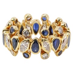 Vintage Harry Winston ring in yellow gold, sapphires and diamonds