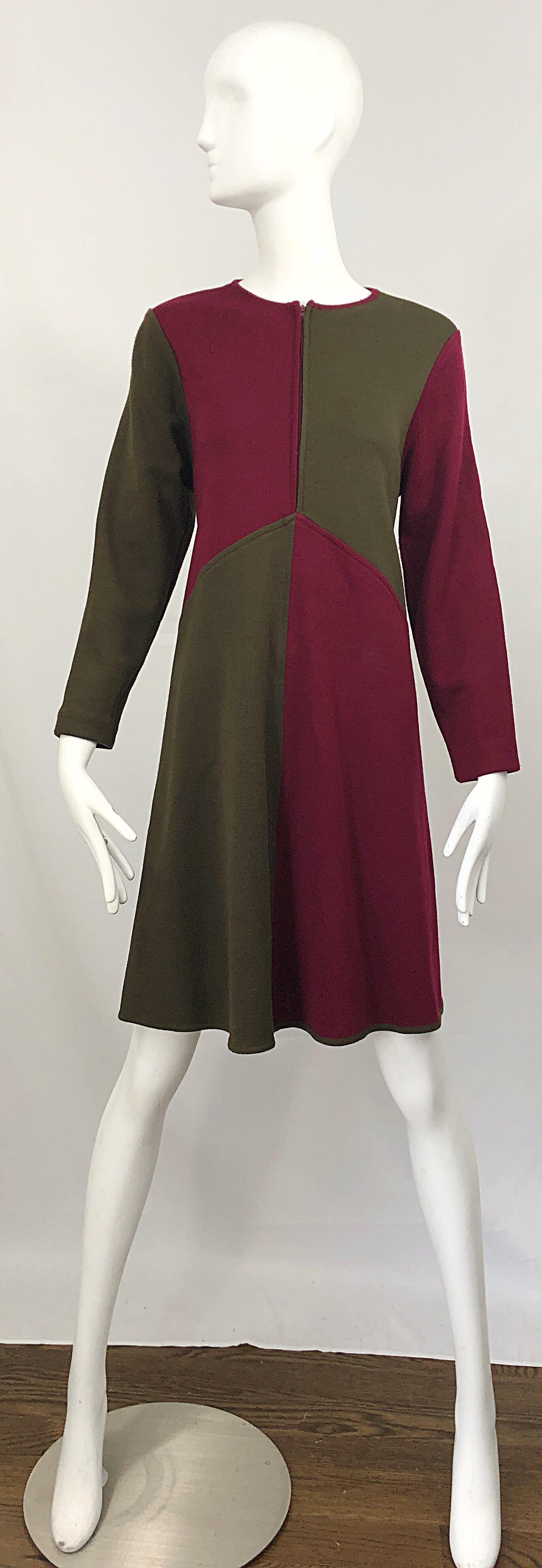 Chic vintage HARVE BENARD by BENARD HOLTZMAN 60s style long sleeve color block wool knit swing / Trapeze A-Line dress! Features a fitted bodice, with a forgiving full swing body. Panels of maroon / burgundy and brown. Hidden zipper up the front can