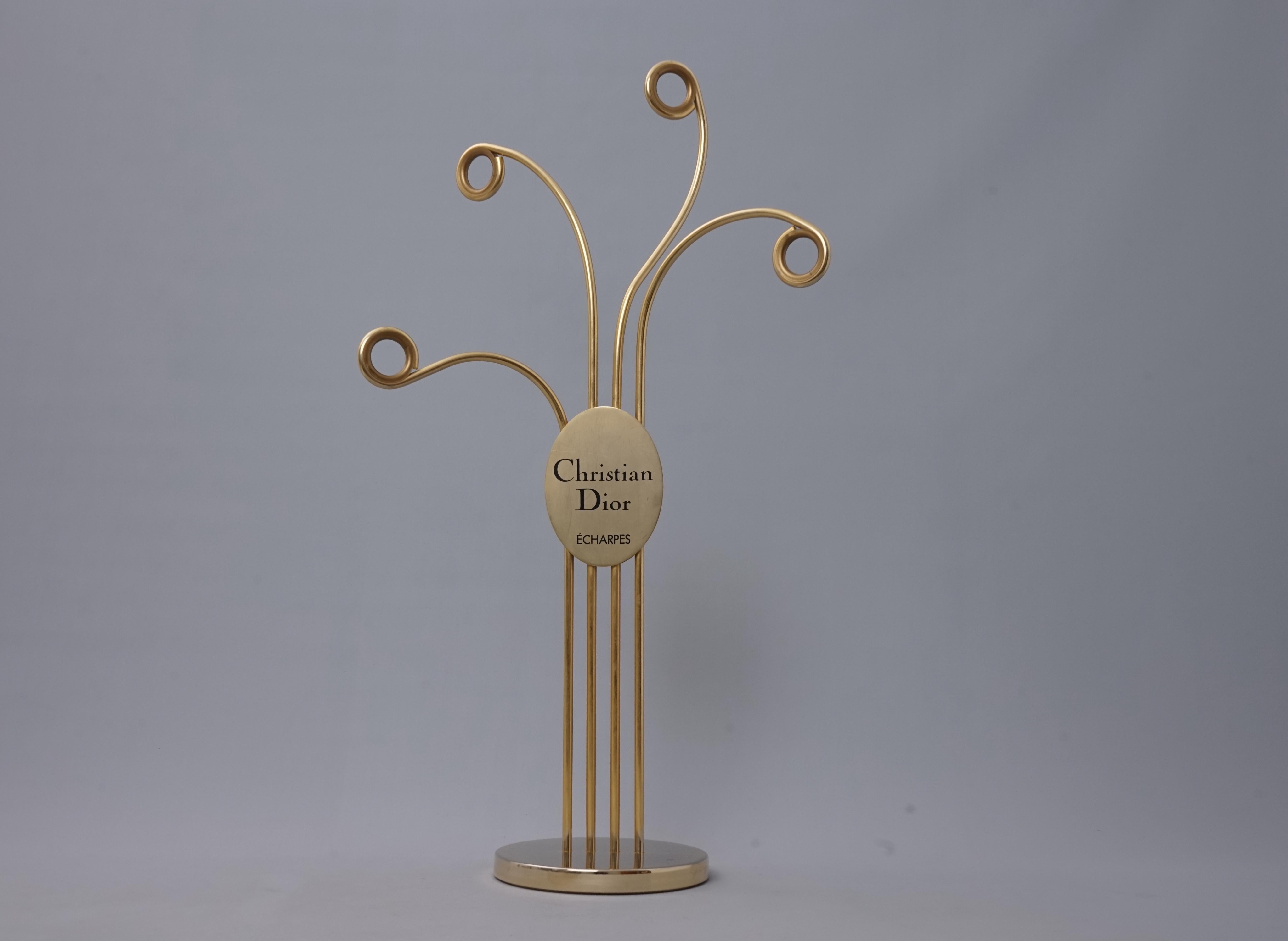 We absolutely love this vintage stand. Fits your hats, scarves, necklaces and bracelets. Made by Christian Dior.