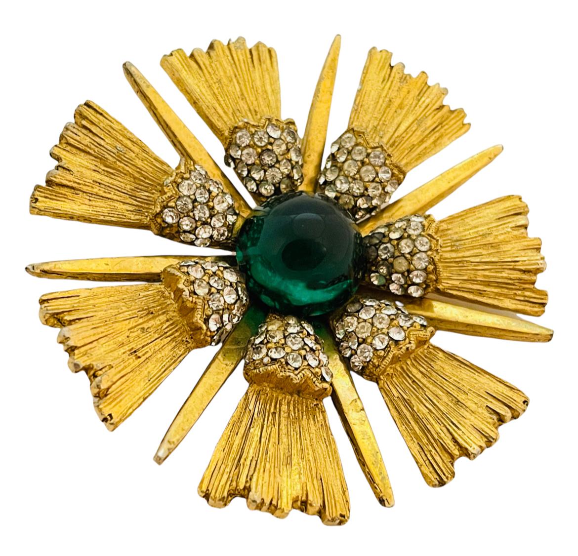 DETAILS
signed HATTIE CARNEGIE
gold tone clear rhinestones and green glass cabochon
vintage designer pin brooch 
collectors piece

MEASUREMENTS  
2 1/4
