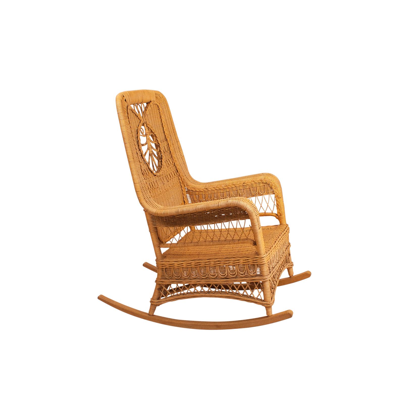 A large scale Vintage Hawaiian painted wicker rocking chair, circa 1950.