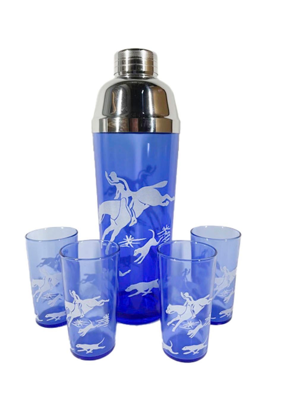 Art Deco Hazel-Atlas cocktail shaker and four tumblers in cobalt glass with white transfer fox hunt scene. The shakers high domed chrome central pour lid with integral strainer.