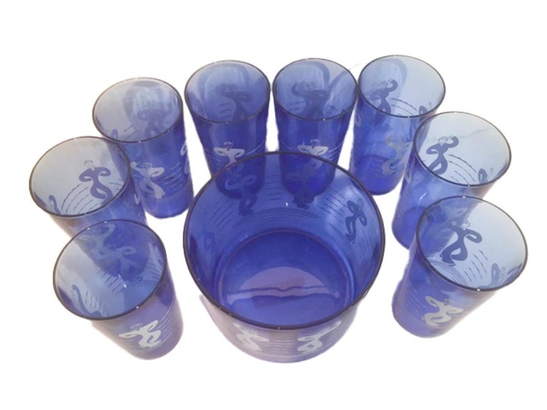 9 piece Art Deco ice bowl set by Hazel Atlas, from the Sportsman Series. Each piece of cobalt blue glass has a repeated design of Dancing Sailors in three alternating positions.

1 - Ice Bowl - 4-1/4