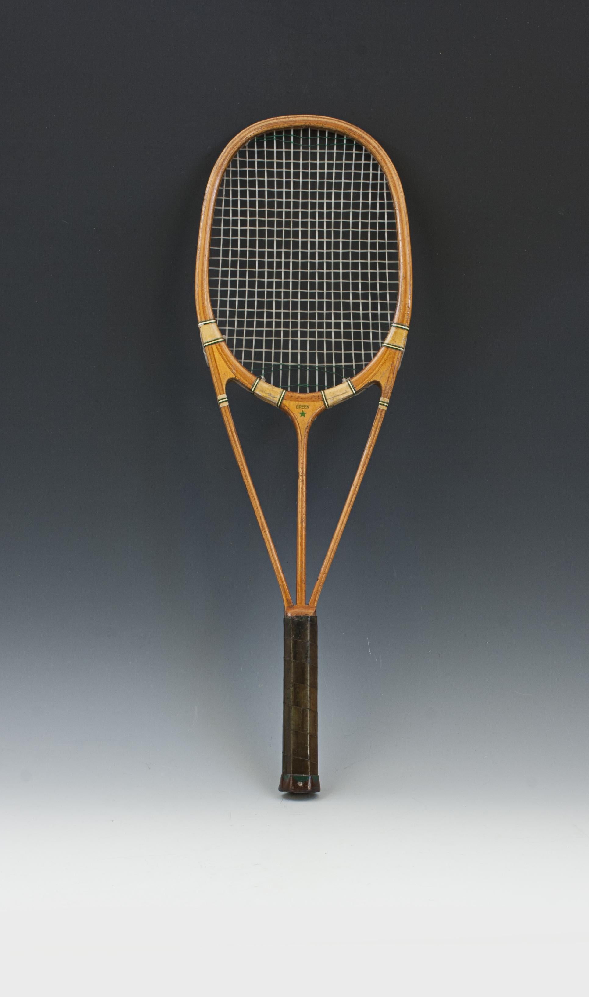 Hazell Streamline Tennis Racket, Green Star.
A good triple branch Green Star Streamline tennis racket made by Hazells' of 111-113 Mare Street, London E 8. The racket is in good condition, all transfers are bright in colour with slight rubbing to