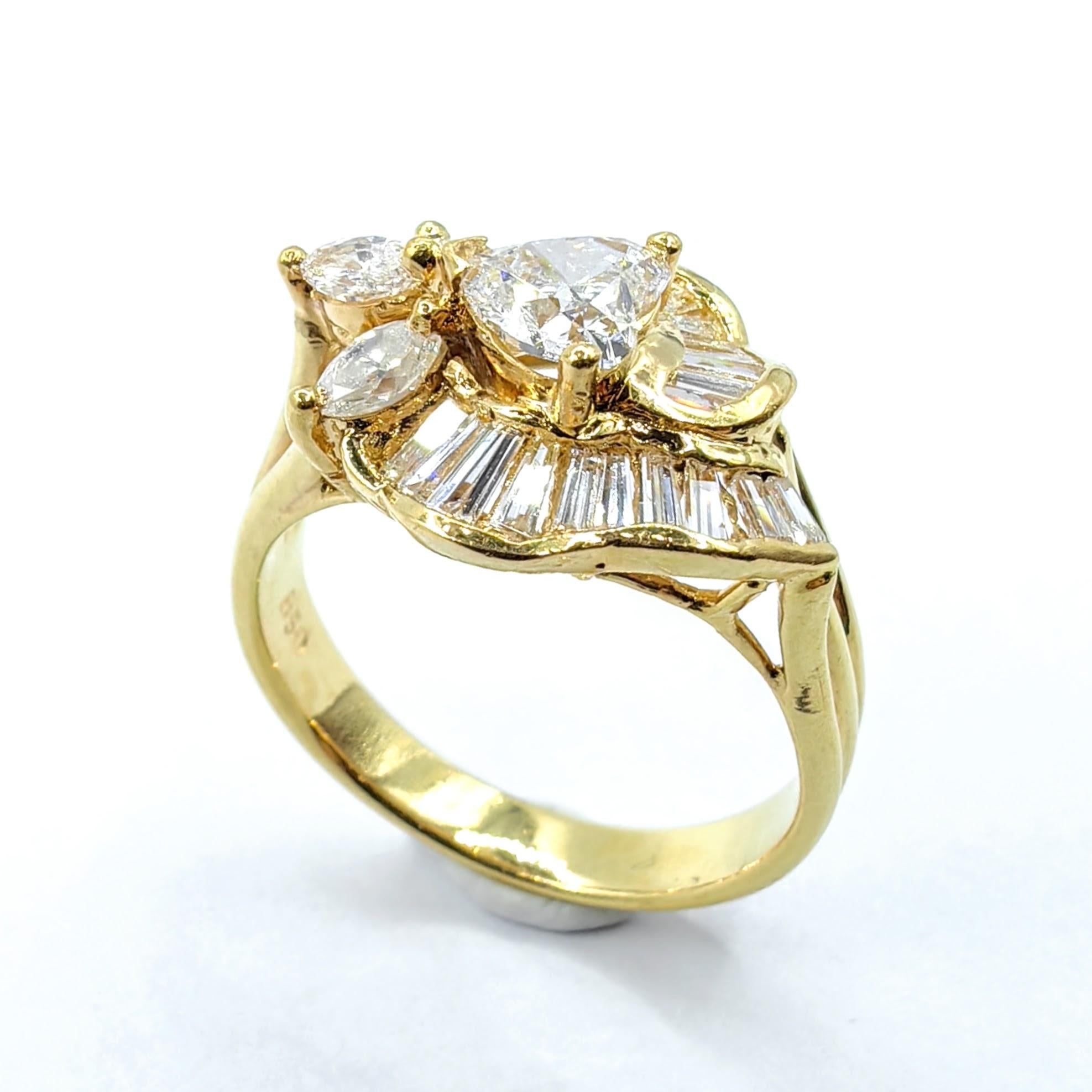 Timeless elegance meets vintage glamour in this exquisite Heart, Marquise, and Baguette-Cut Diamond Ring, set in luxurious 850 yellow gold. This breathtaking piece showcases a 0.55ct heart-shaped diamond at its center, radiating brilliance and charm