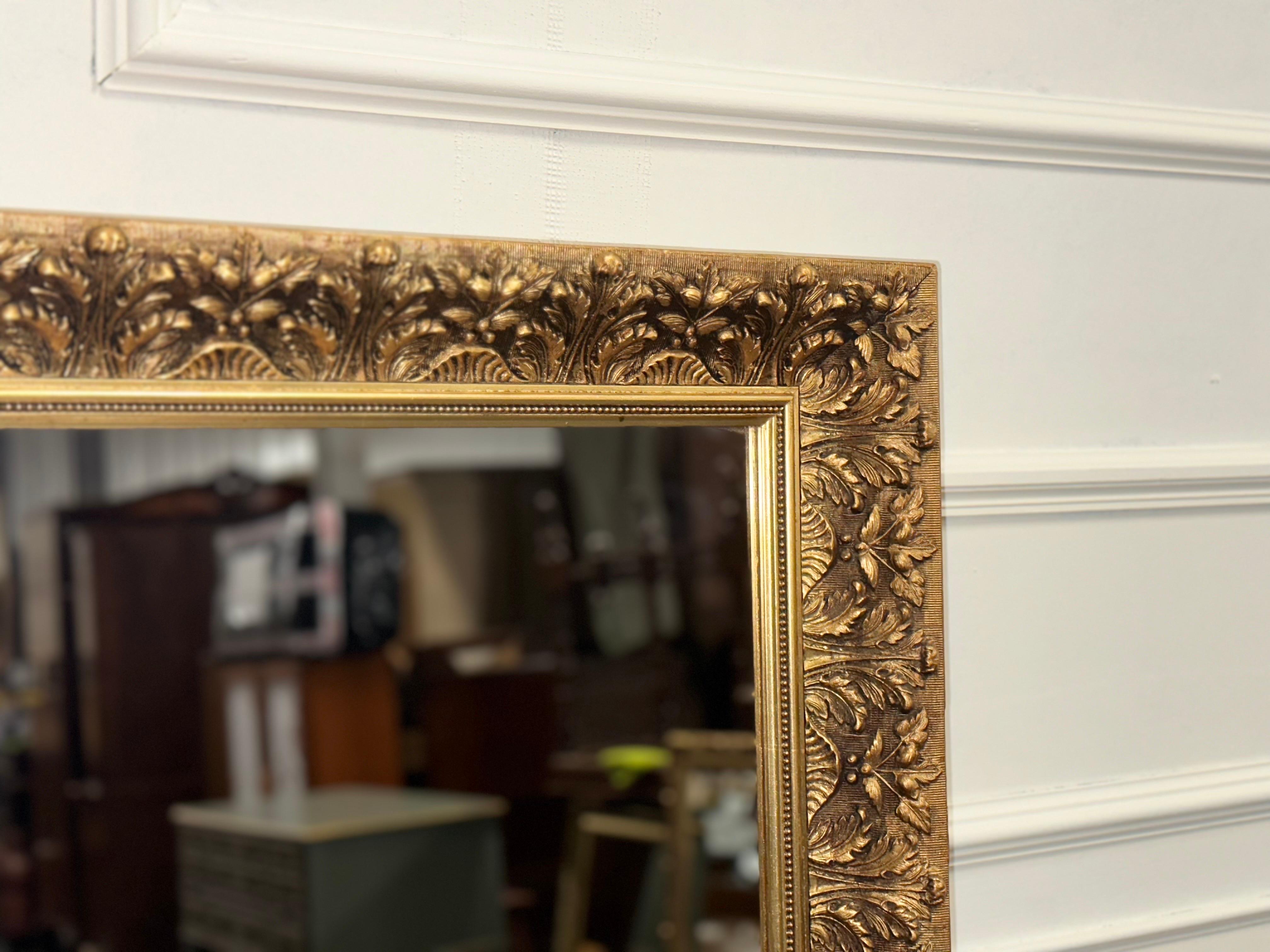 Vintage Heavily Carved Gold Ornate Bevelled Mirror In Good Condition In Pulborough, GB