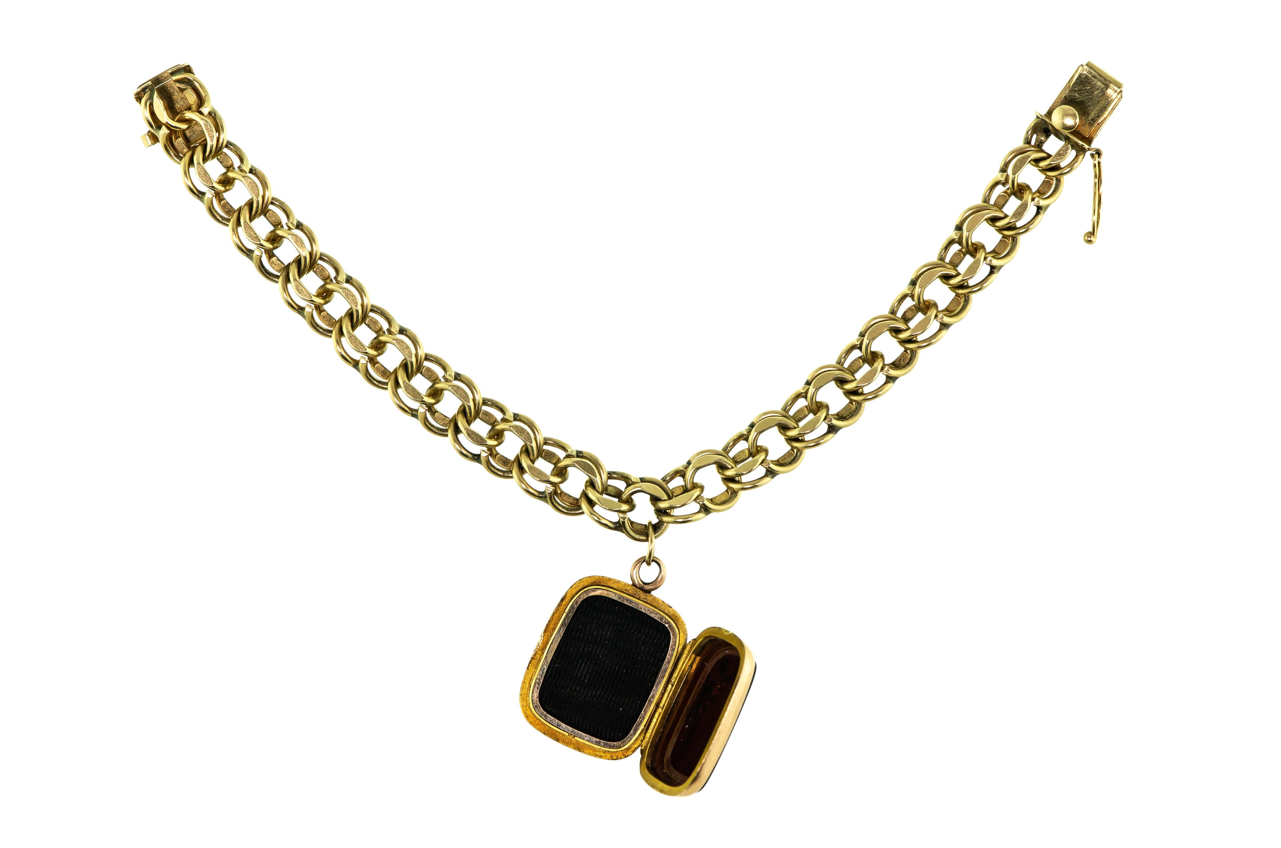 Exquisite vintage heavy 14k wide flexible yellow gold bracelet double link with 14k gold antique hardstone intaglio locket of 