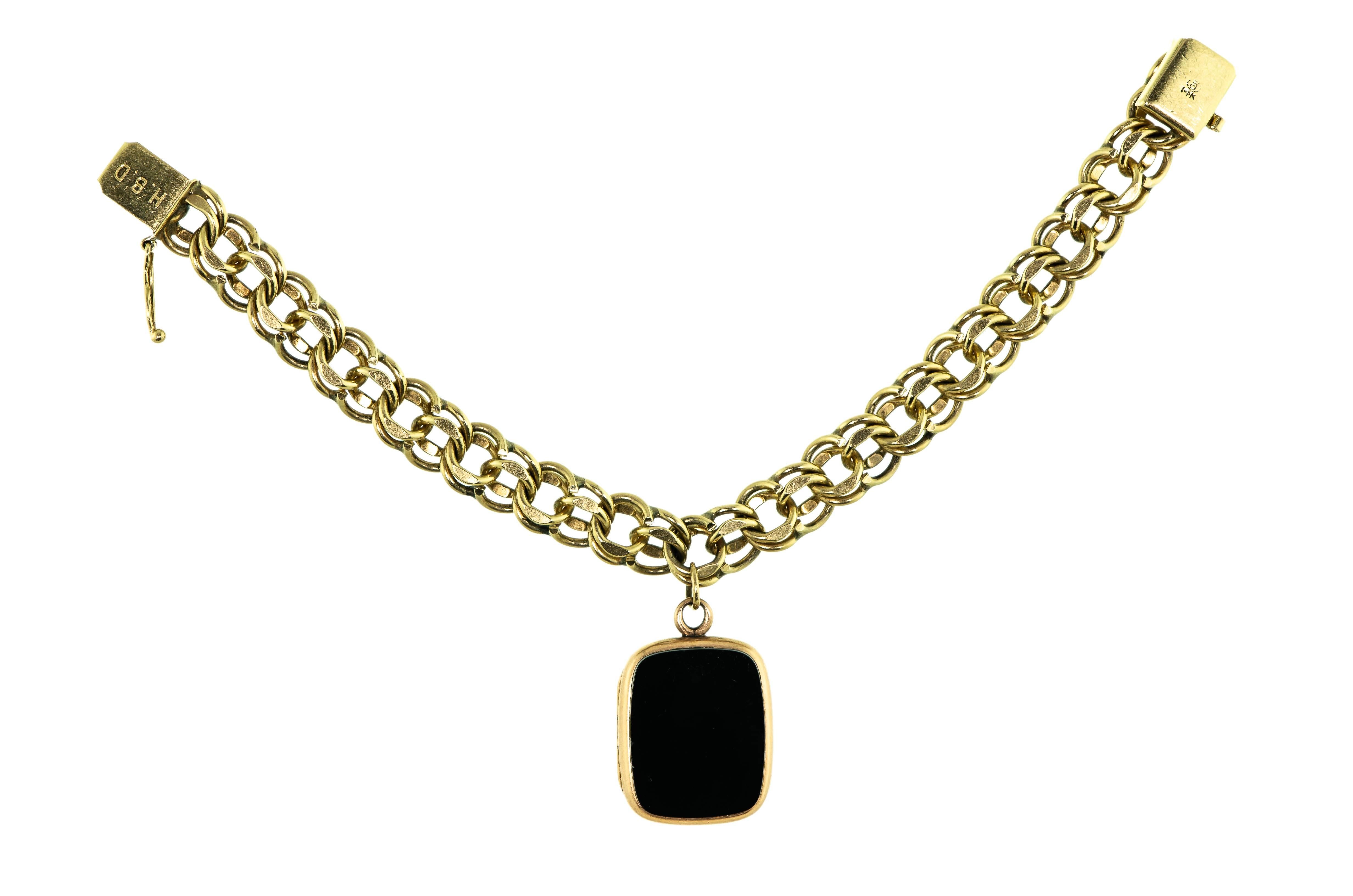 Women's Vintage Heavy 14 Karat Flexible Bracelet with Antique Hardstone Intaglio Locket For Sale