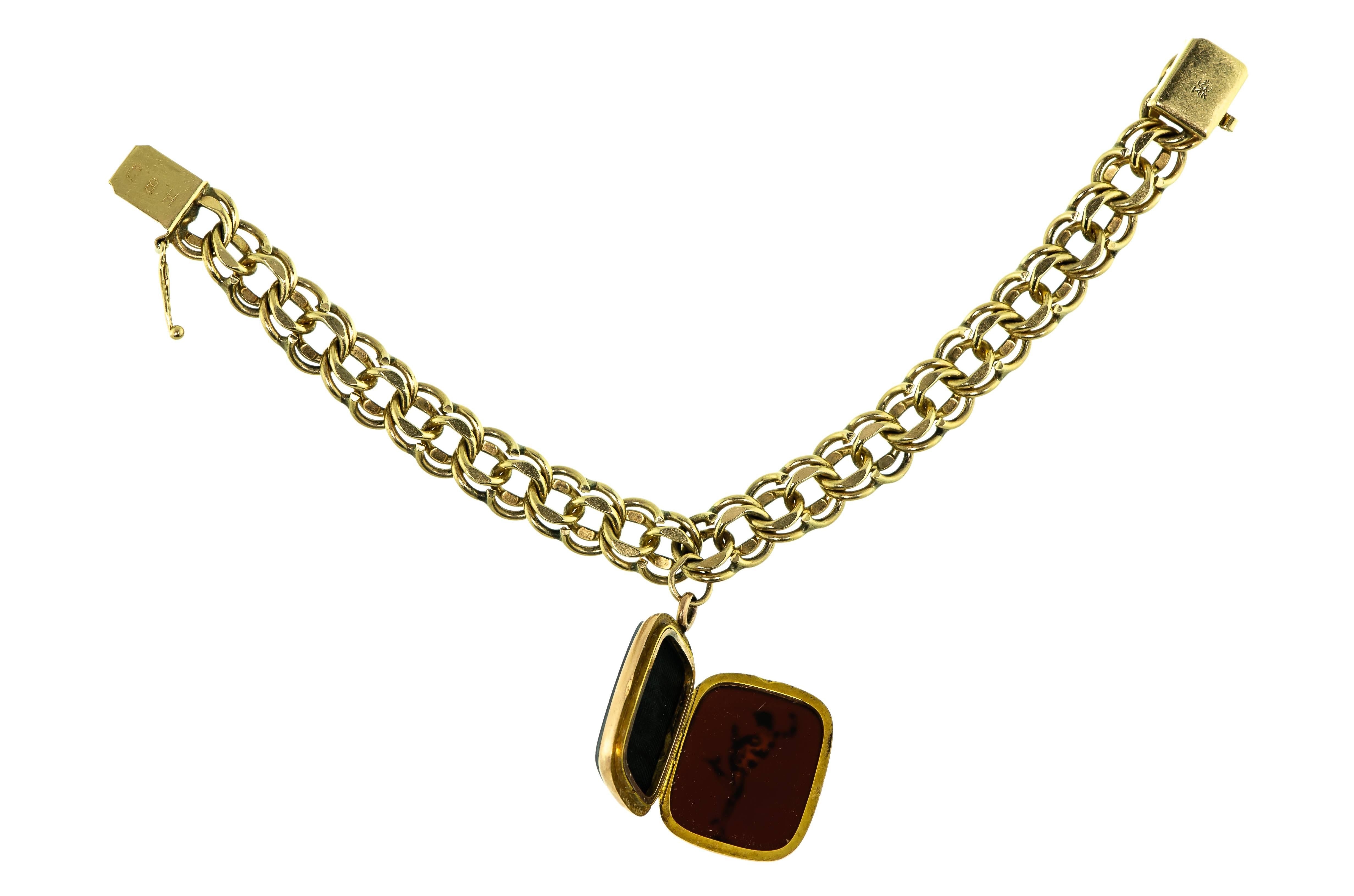 Vintage Heavy 14 Karat Flexible Bracelet with Antique Hardstone Intaglio Locket For Sale 1