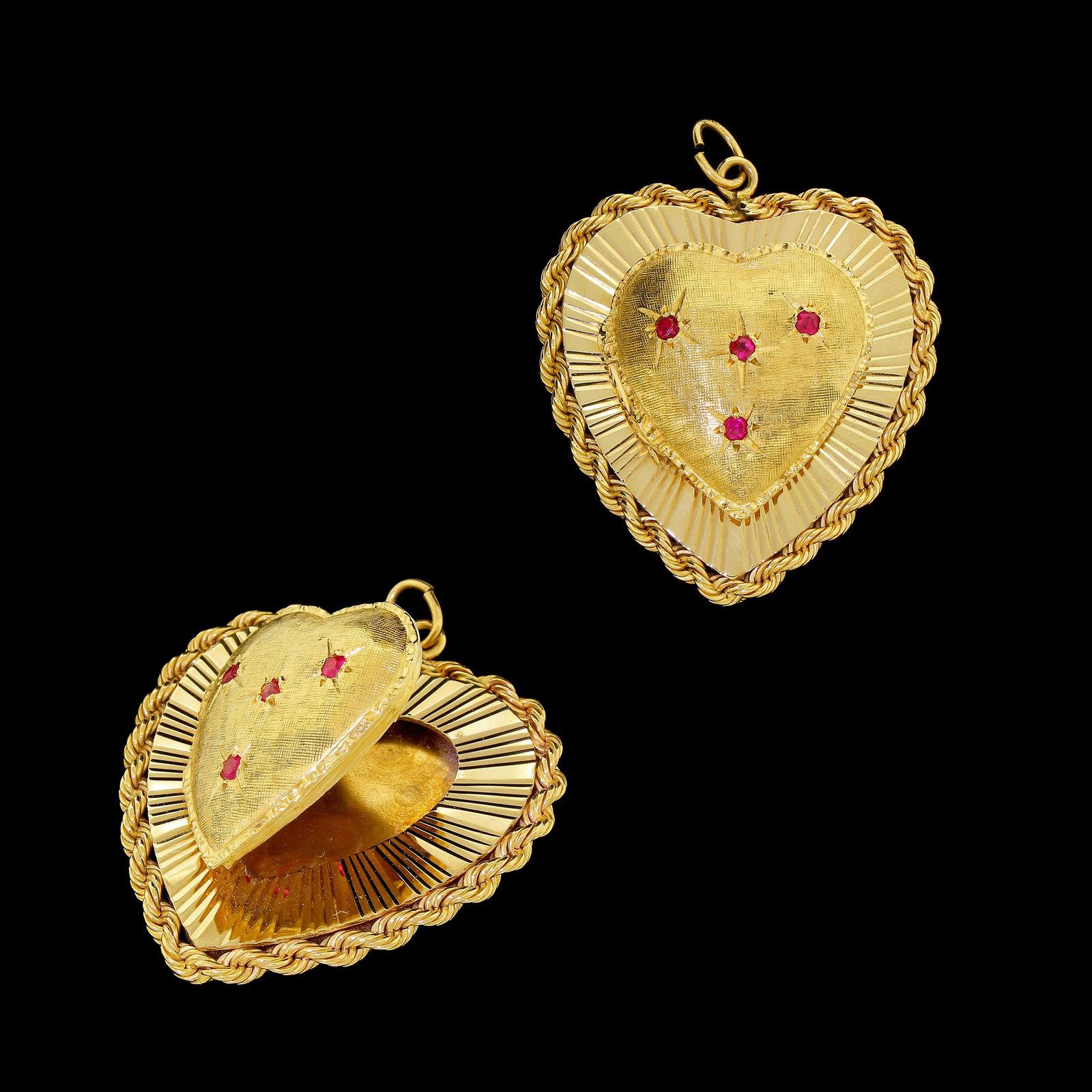 Details & Condition: Beautiful 14k solid gold Ruby Love heart photo locket pendant that dates from the early 
1960's - I doubt very much if you will find one in the condition that this one is in - it has been very well looked after, always boxed and