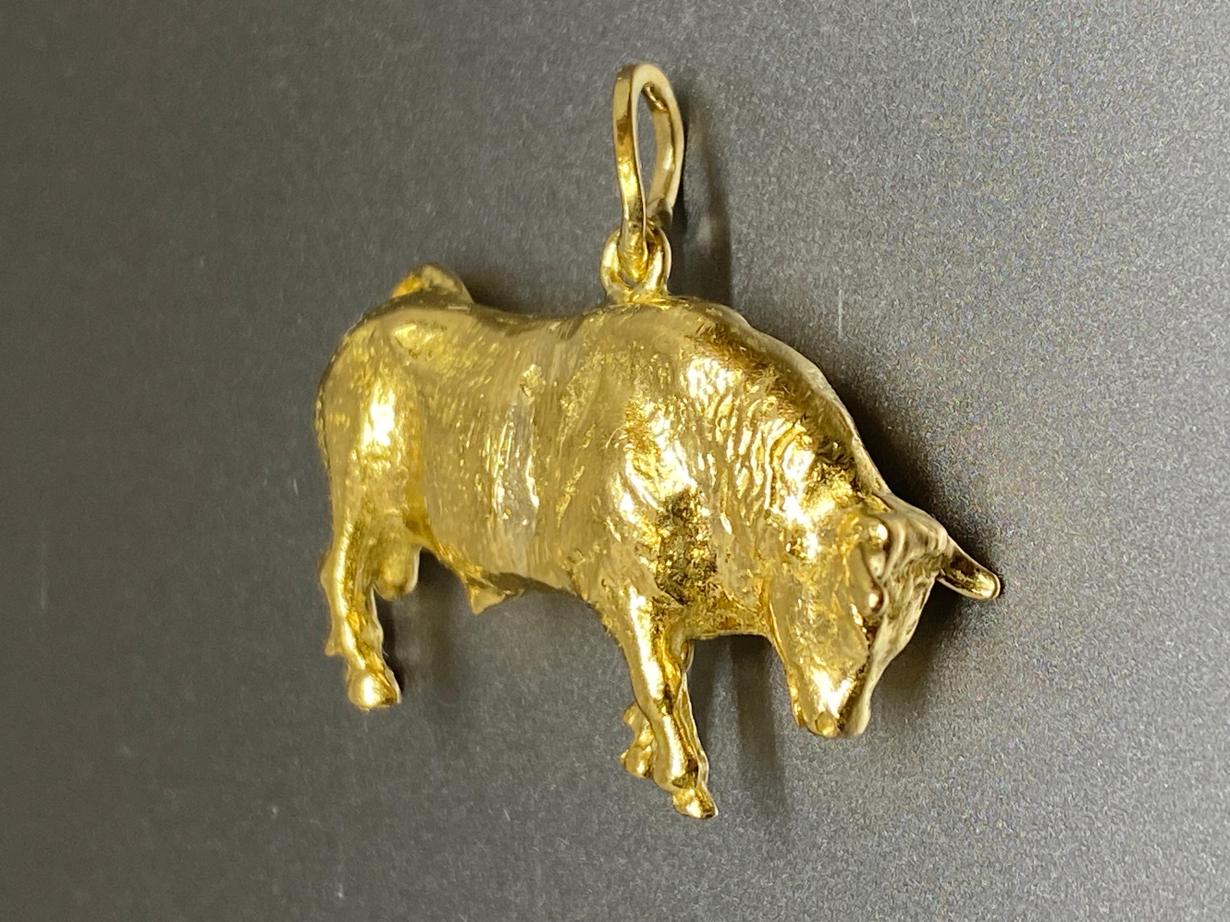 14k gold bull pendant