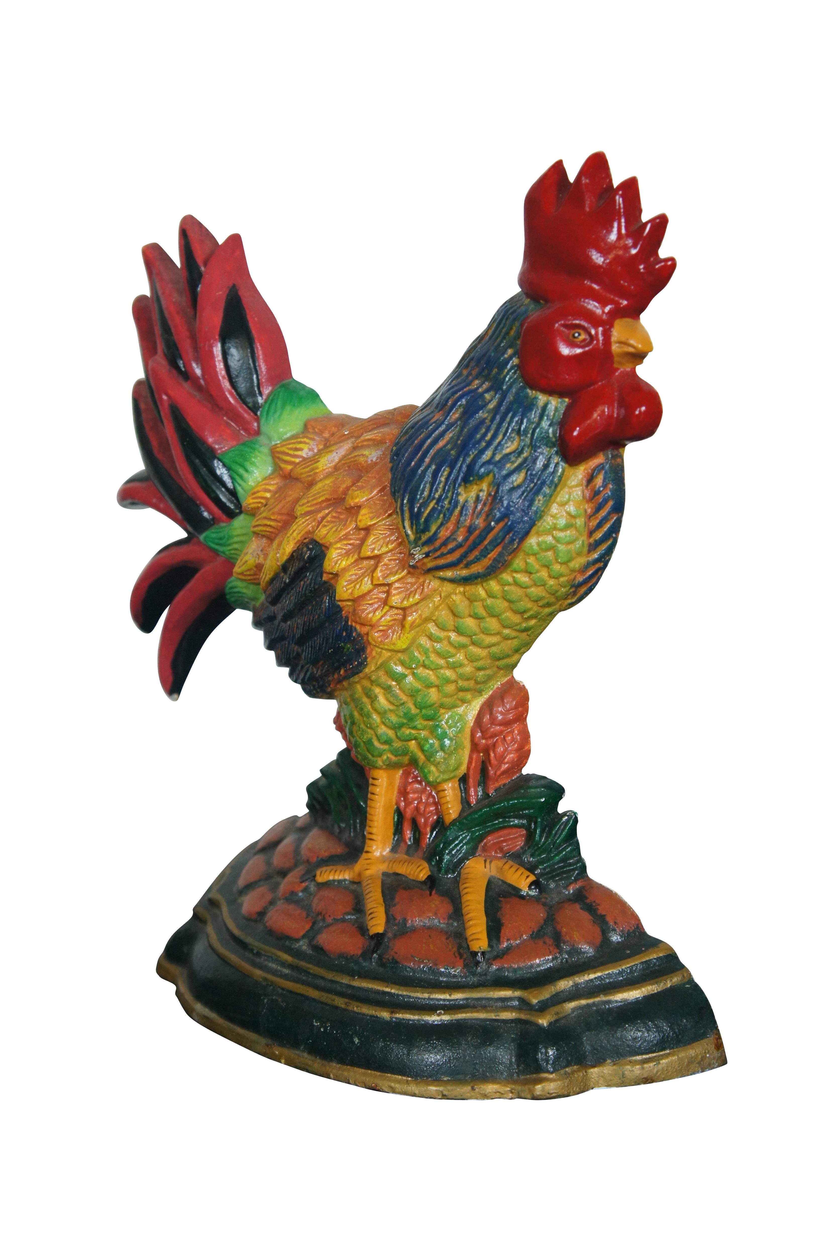 Vintage colorful painted cast iron door stop in the form of a chicken / rooster or bird.

Dimensions:
11” x 3.5” x 11.75” (Width x Depth x Height)