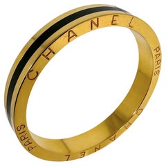 Vintage Heavy Chanel Gold Tone Metal Bangle With Black Resin Stripe 11.5mm Wide