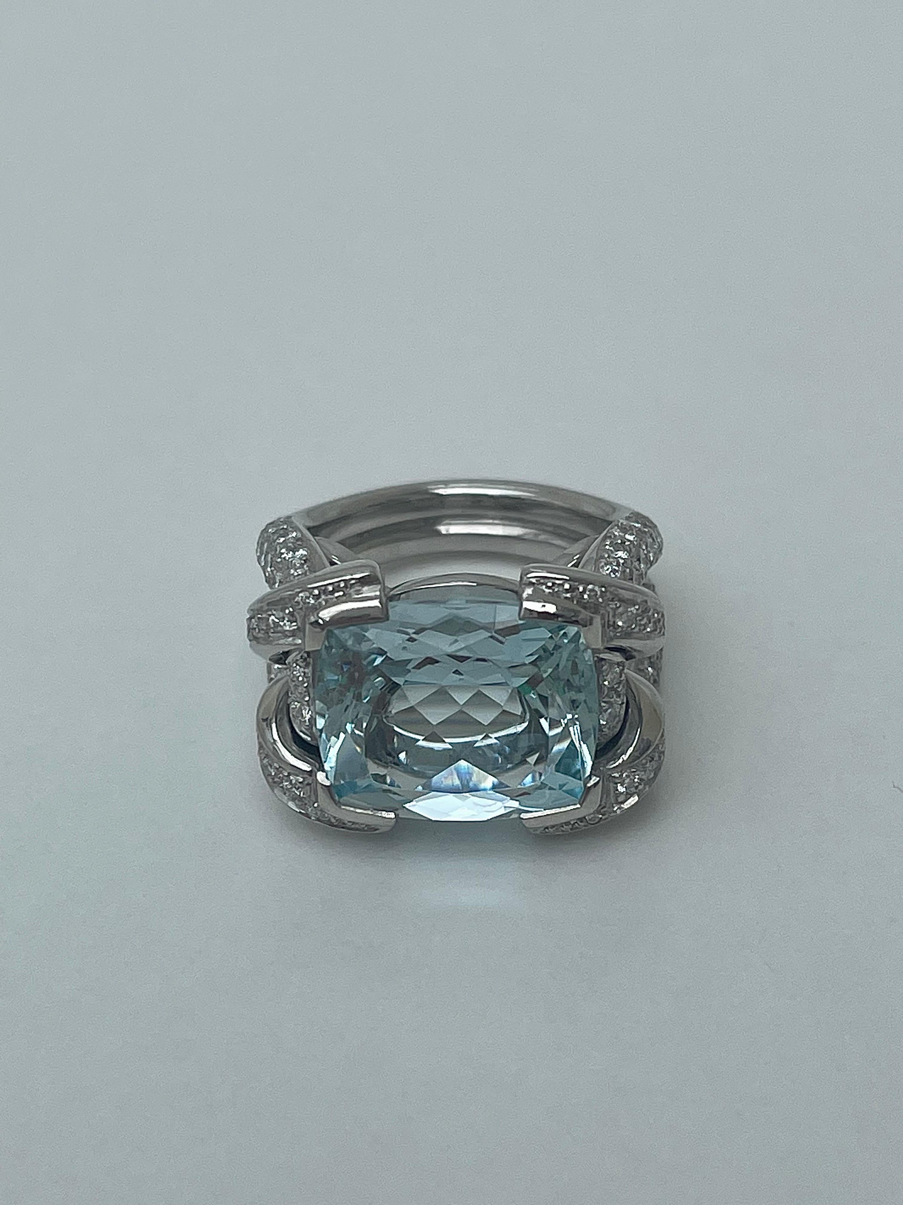 Vintage Heavy Platinum Aquamarine and Diamond Adorned Ring 

outstanding diamond spilt shoulders, with an incredible large aquamarine stone, perfect statement ring! 

Diamonds are of the highest quality. 

The item comes without the box in the