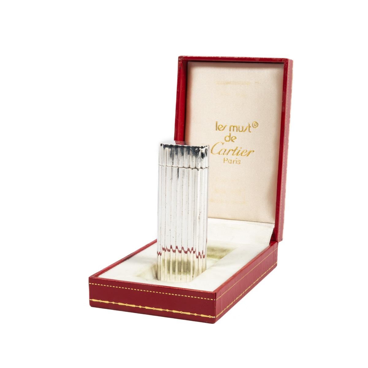 Vintage Solid Silver Sleeved Cartier Les Must lighter

This custom-made Solid silver-sleeved Cartier Les Must is truly eye candy. This lighter has been through full service, so no gas leaking. Made approximately in the 1970s, this lighter has