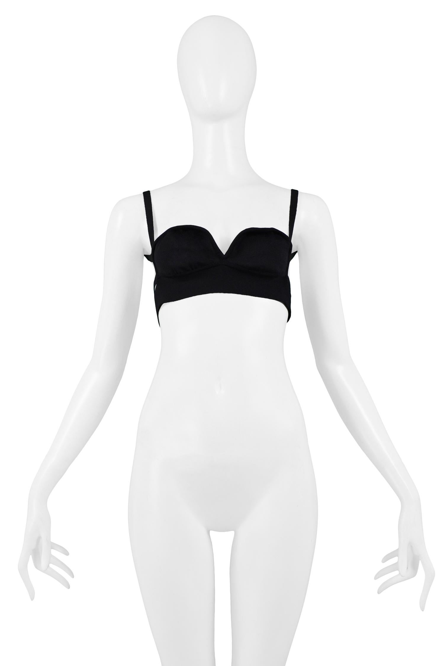 Vintage Helmut Lang black knit bra with sweetheart shaped cups, shoulder straps that loop under the arm, and double straps at back. Collection 2001.

Excellent Vintage Condition.

Size: 42